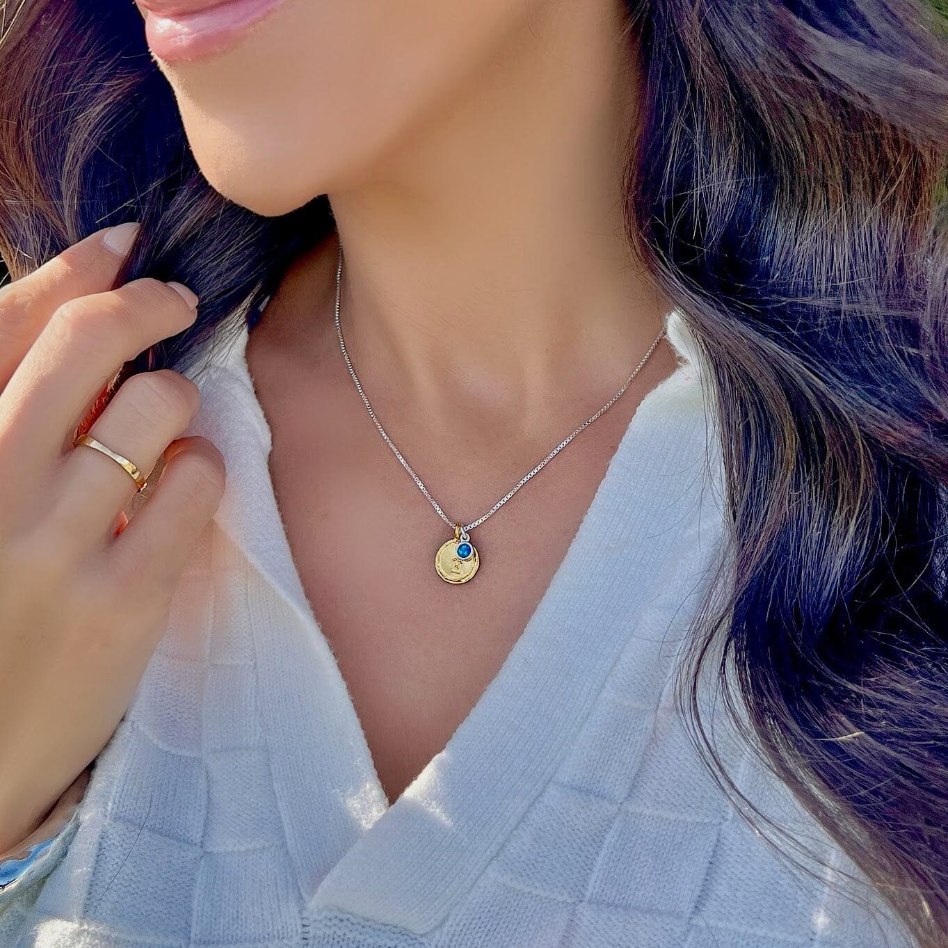 Sterling silver gold plated silver disk with an initial stamped