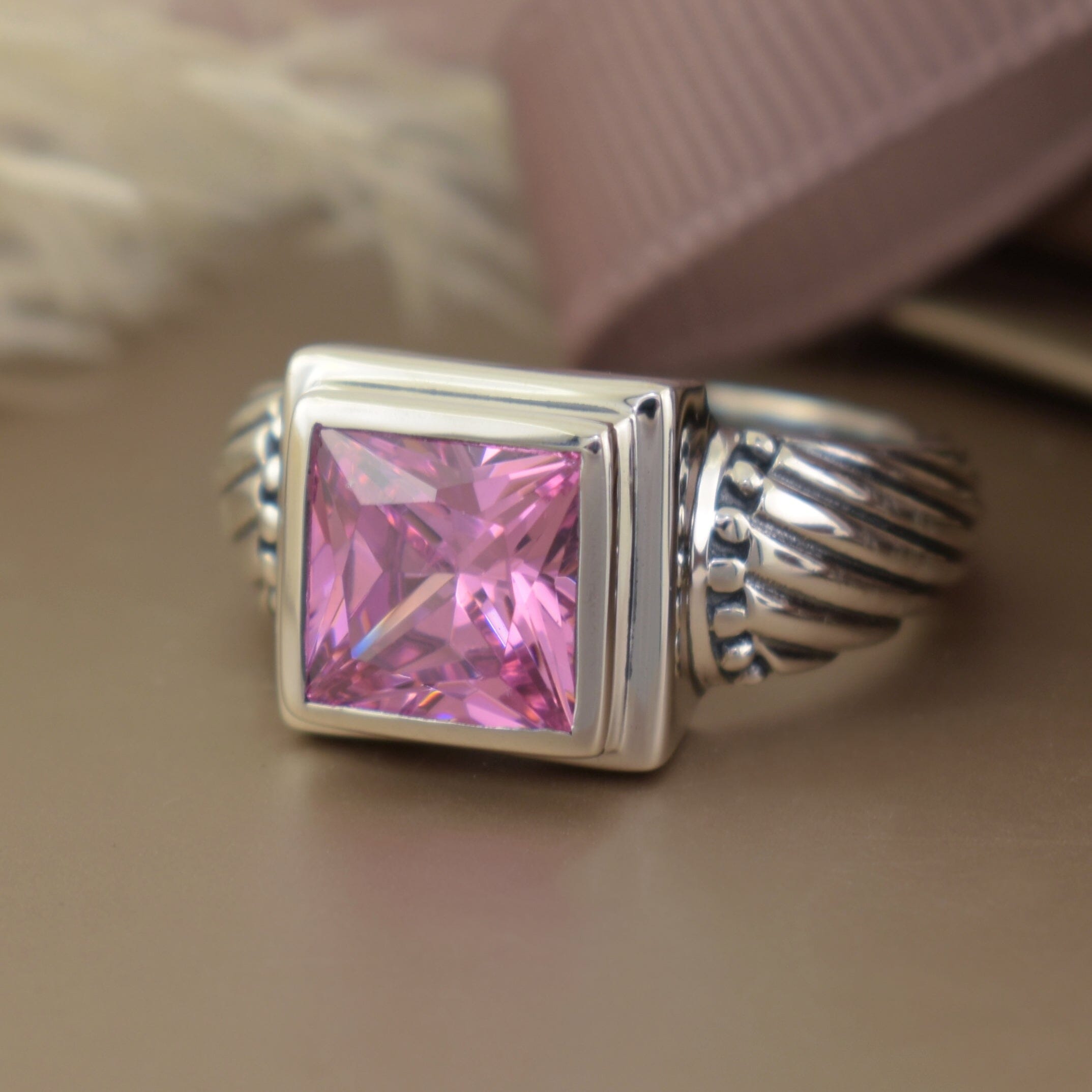 princess-cut pink cubic zirconia bezel set in designer sterling silver