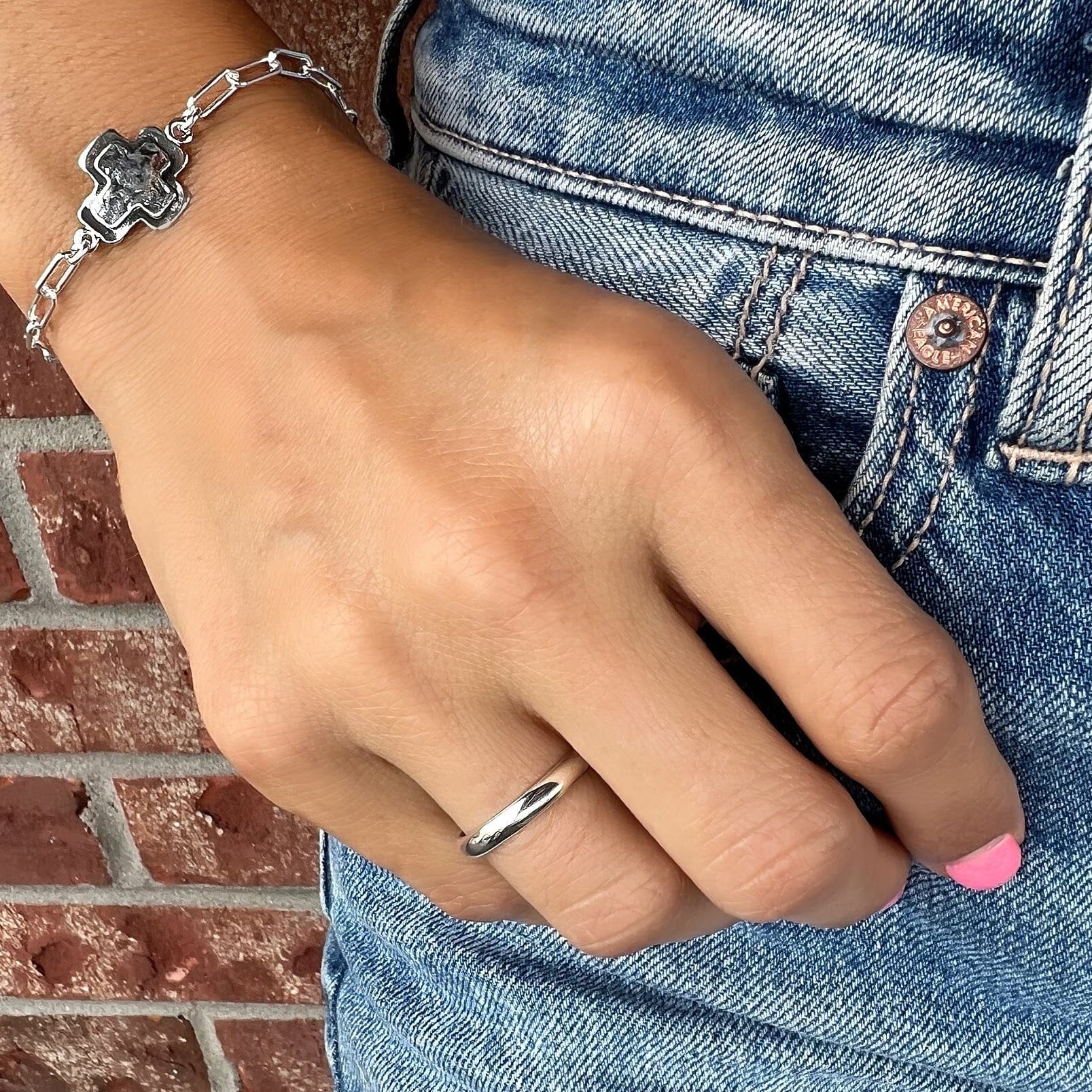 Plain Jane Ring paired with dainty paperclip cross bracelet