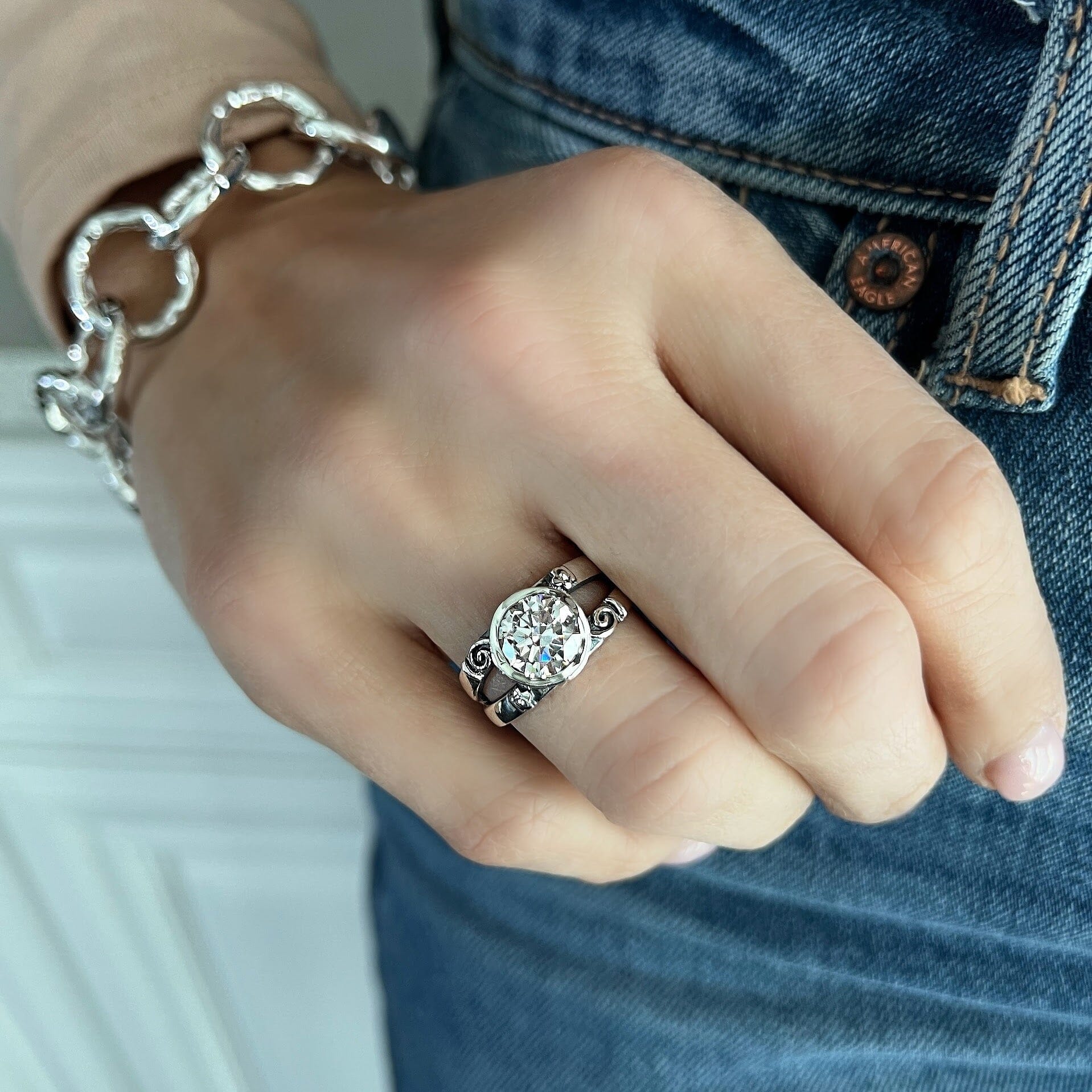 sterling silver ring with a double band featuring a cubic zirconium stone