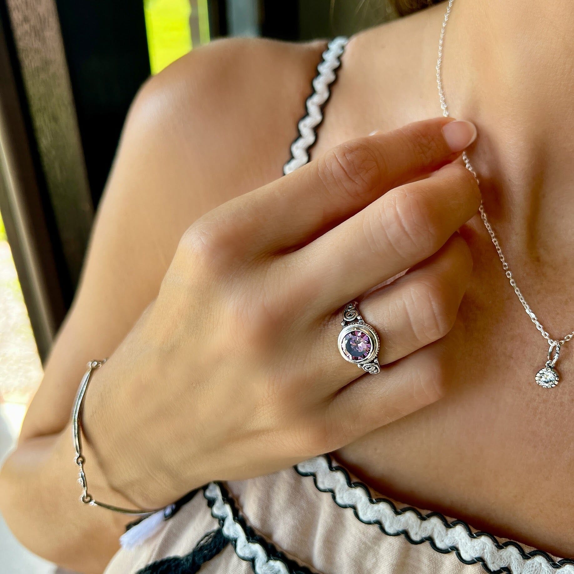 Plum fancy ring paired with just say'n bracelet and sparkle on necklace