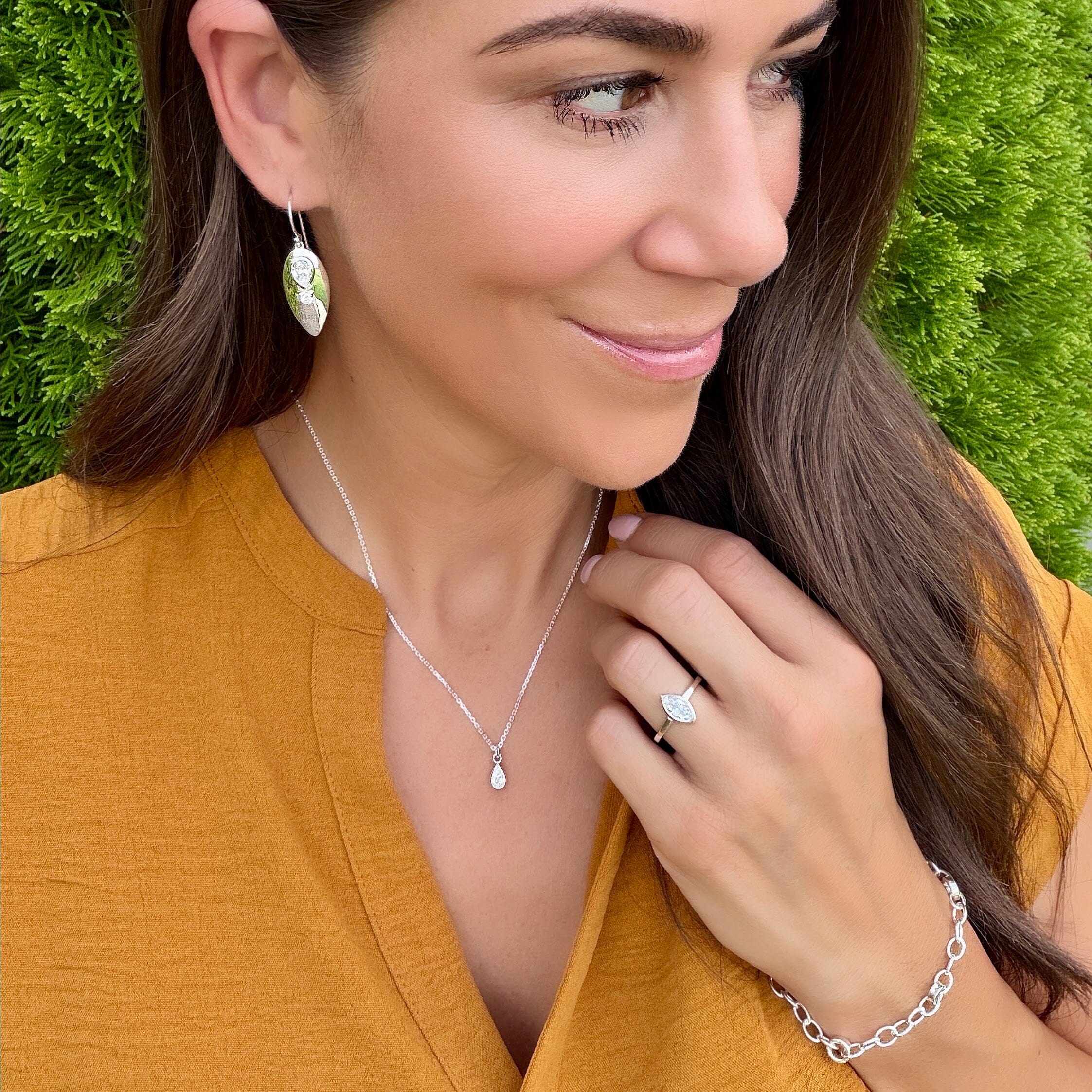 Point Taken Ring paired with Silver Society Bracelet, Beautifully Broken Necklace, and Party On Earrings
