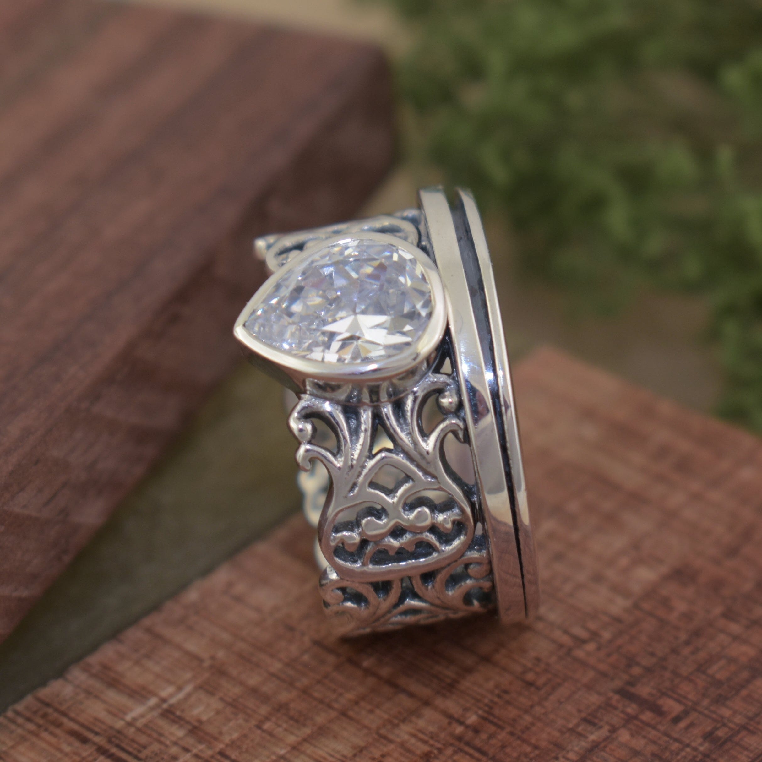 Ornate sterling silver and cz spinner band ring
