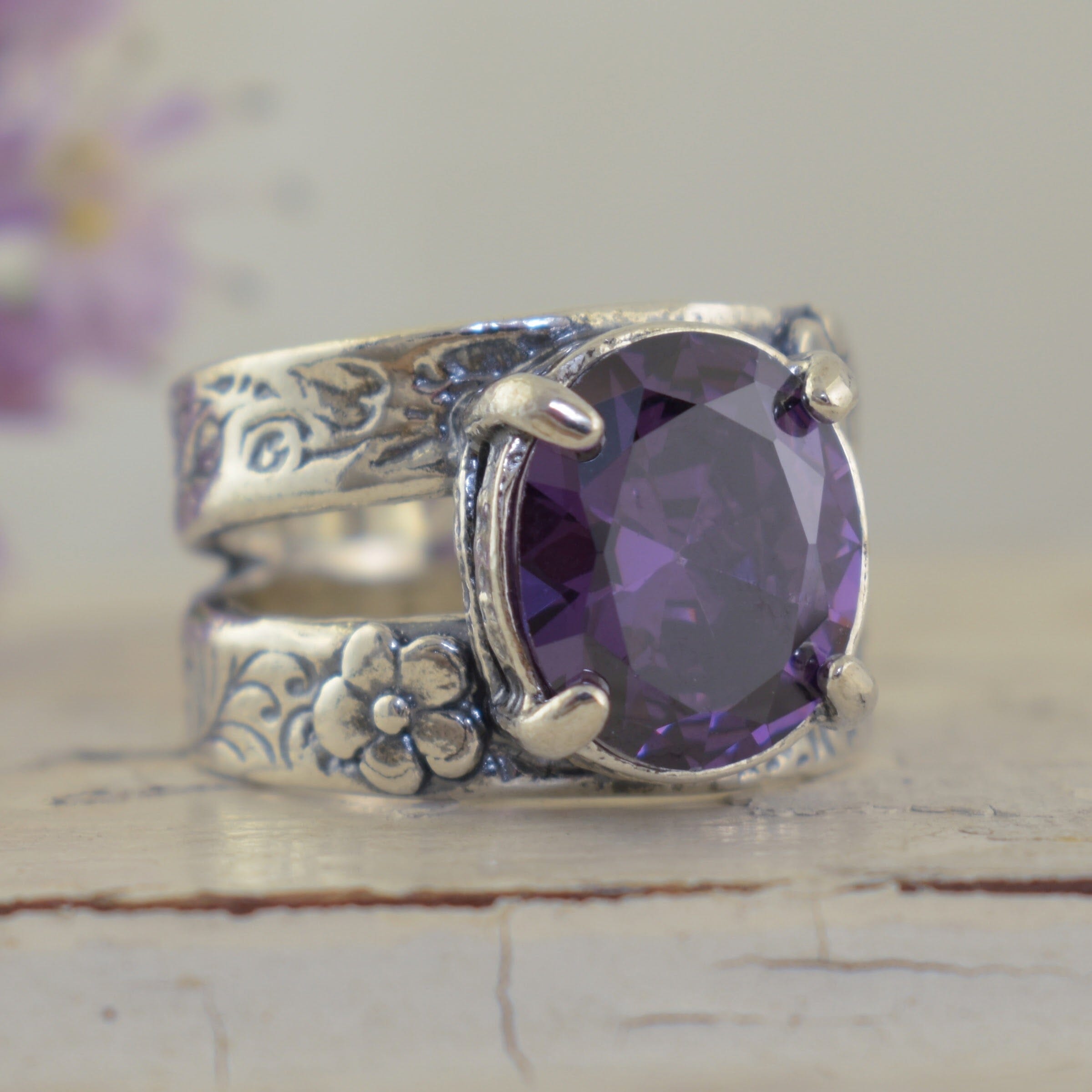 Chunky sterling silver flower ring with oval shaped amethyst CZ stone