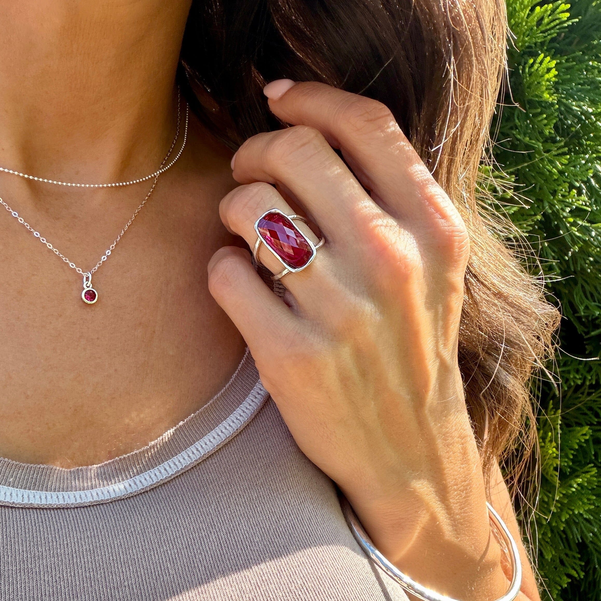 sterling silver and magenta colored gemstone jewelry