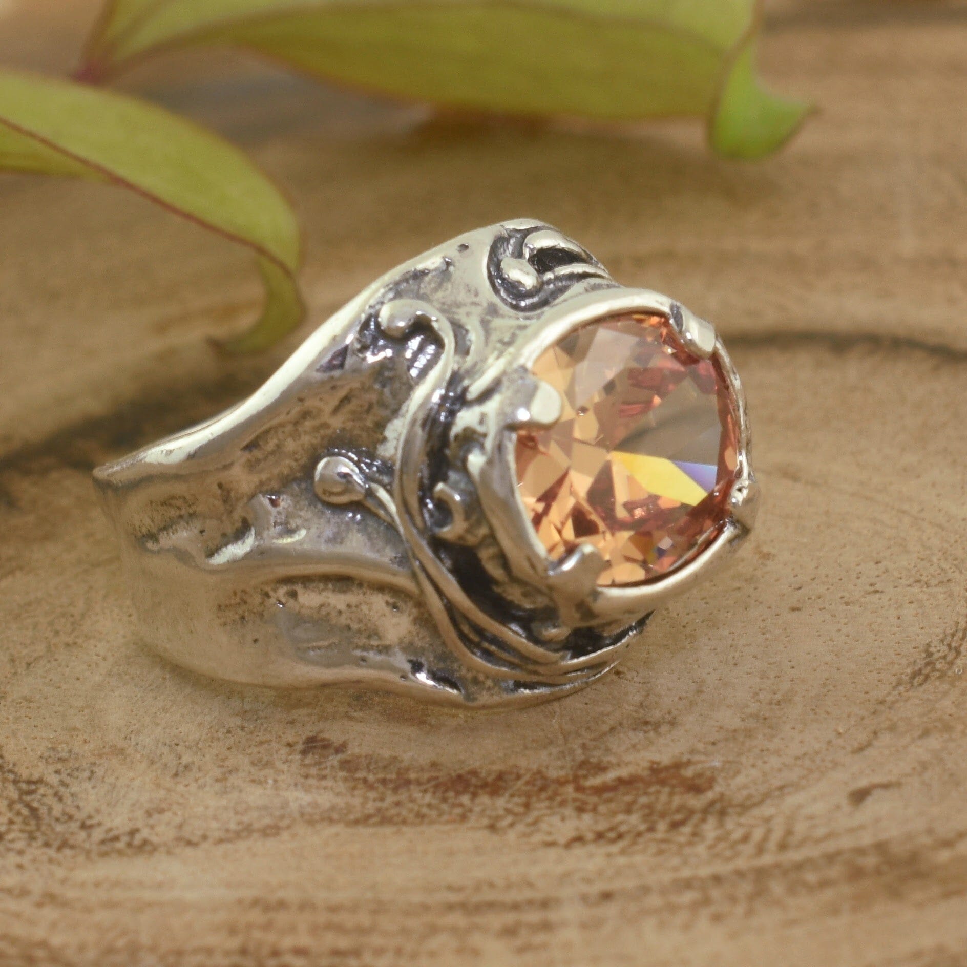 chunky sterling silver ring with oval peach colored stone