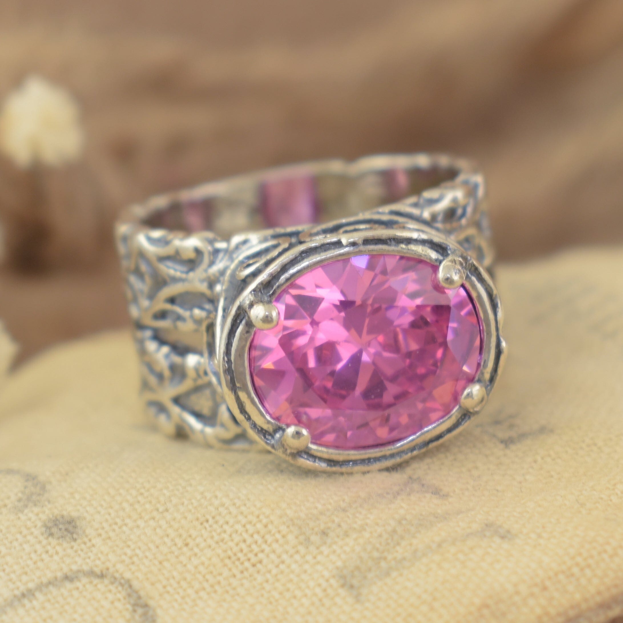 Oval shaped pink cubic zirconia ring set in antiqued .925 sterling silver