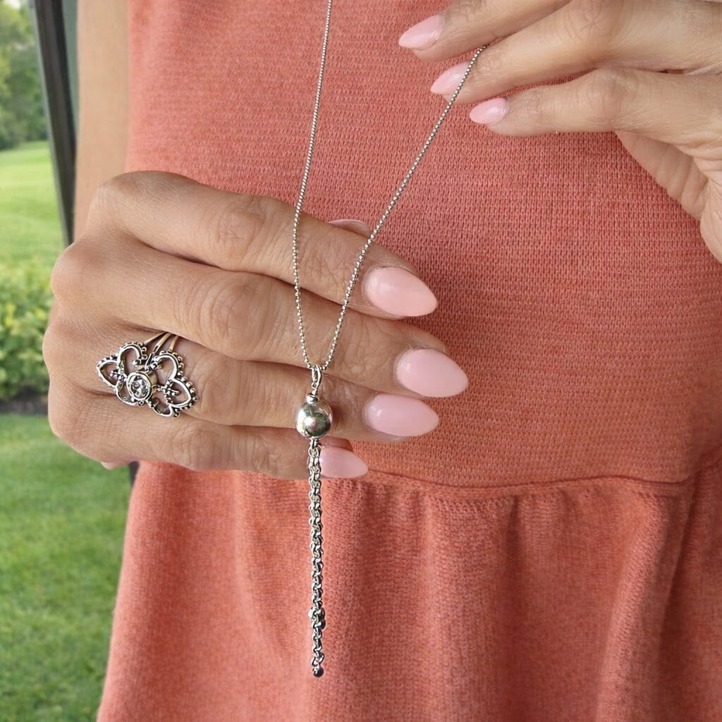 bead chain necklace with a silver bead pendant