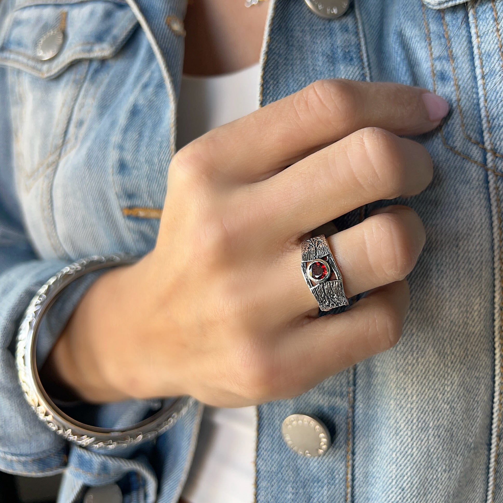 Redwood Ring featuring round bezel set garnet