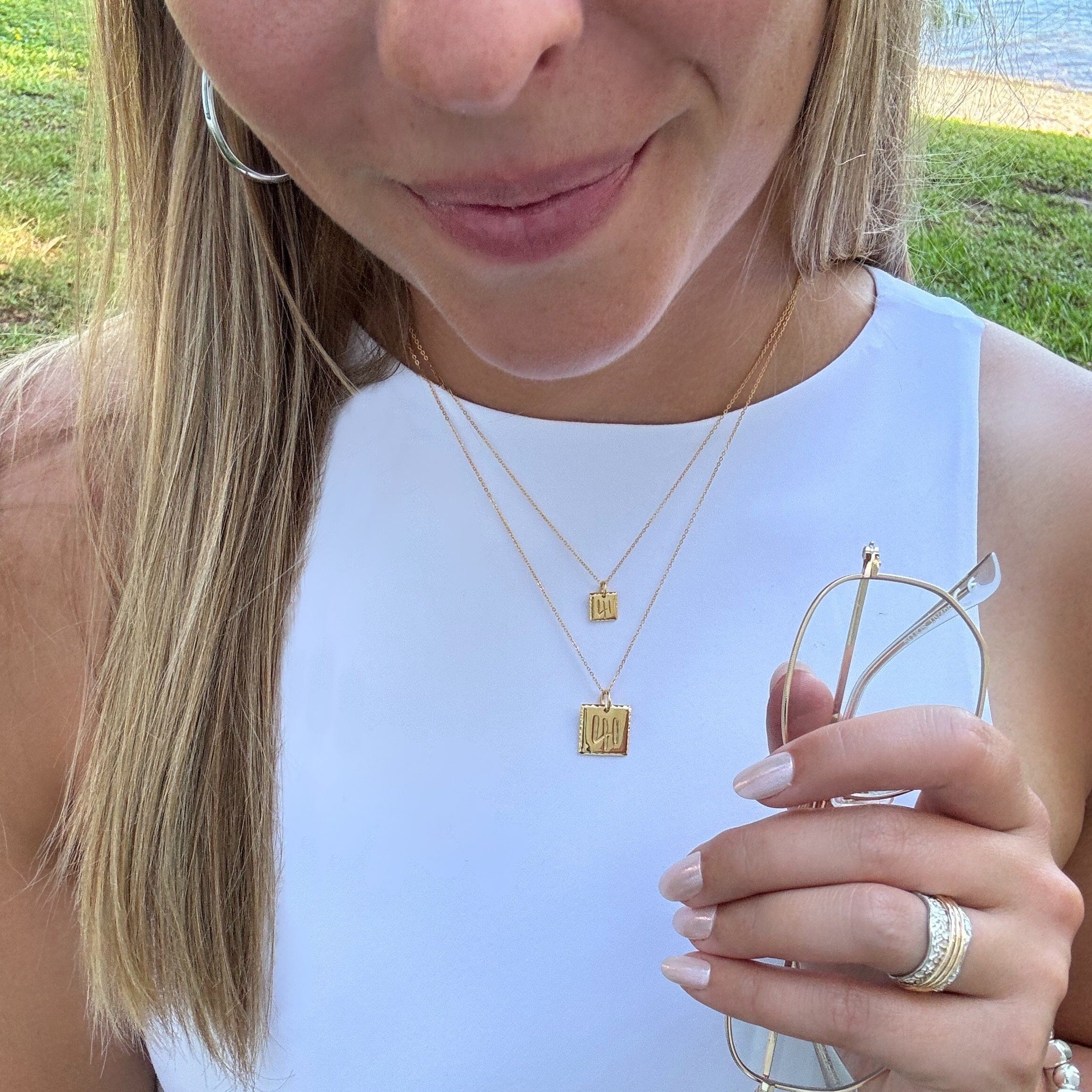 gold 41 mini and standard sized pendants on chains