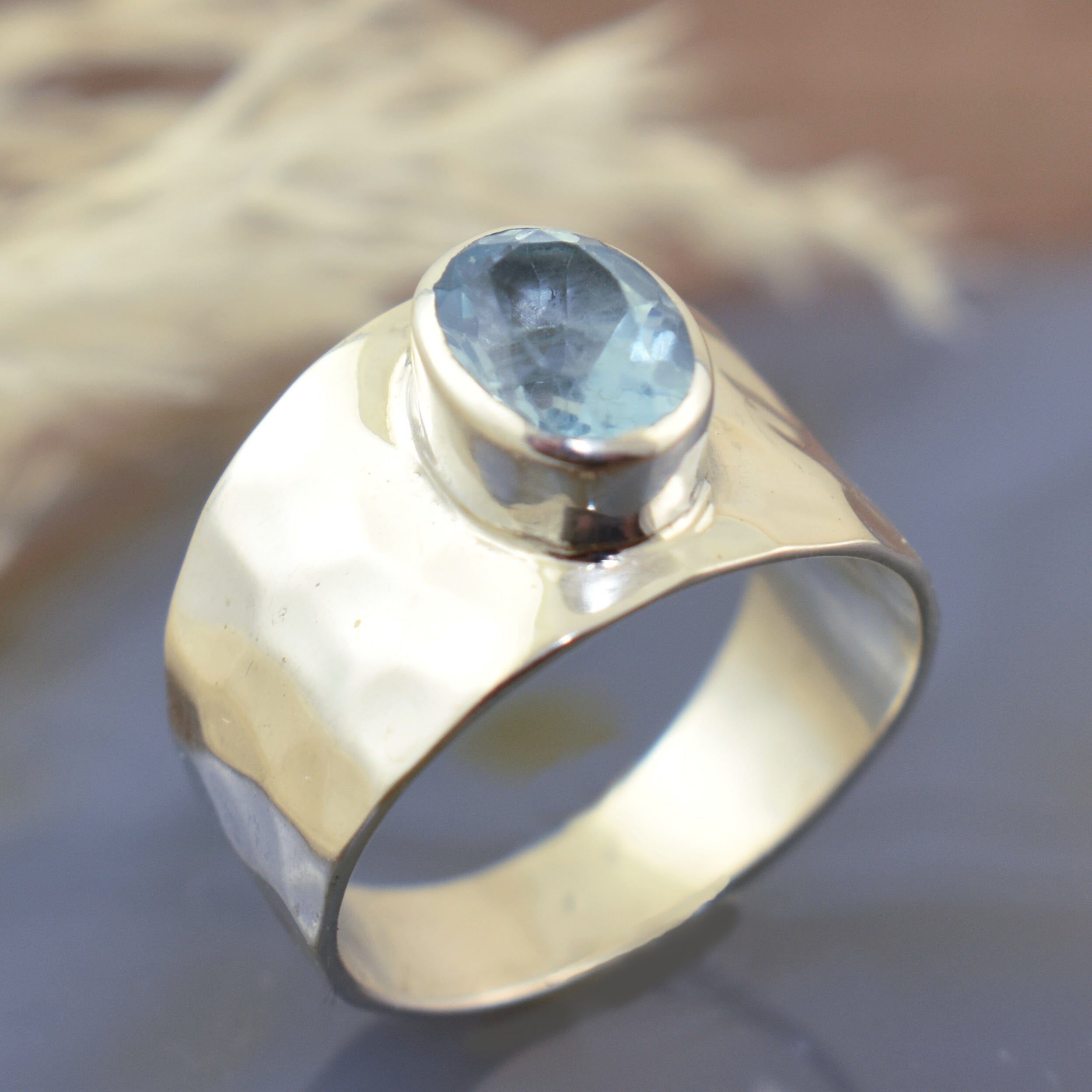wide blue topaz ring with hammered finish- Right as Rain