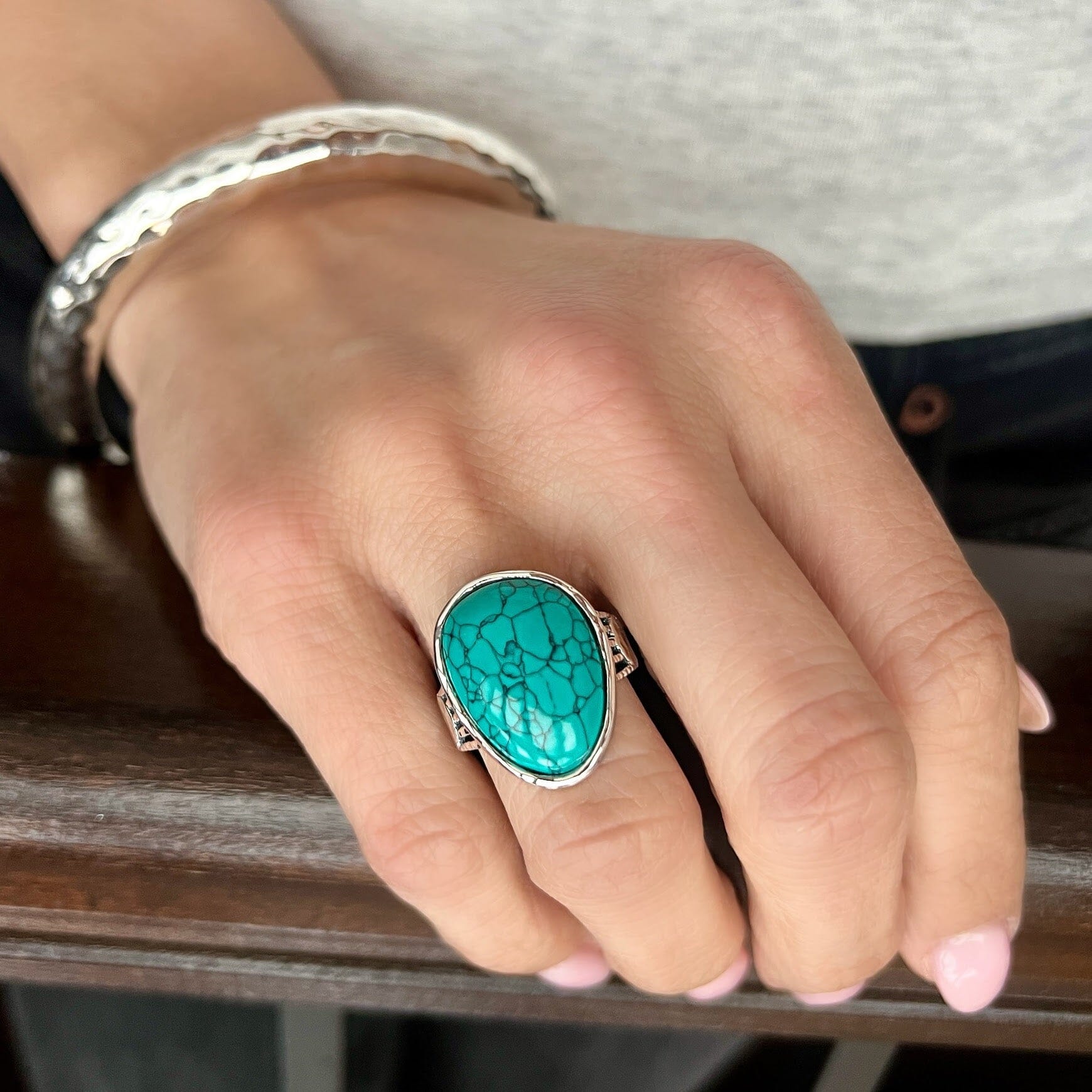 chunky western style ring featuring a unique-shaped howlite stone bezel set in handcrafted sterling silver
