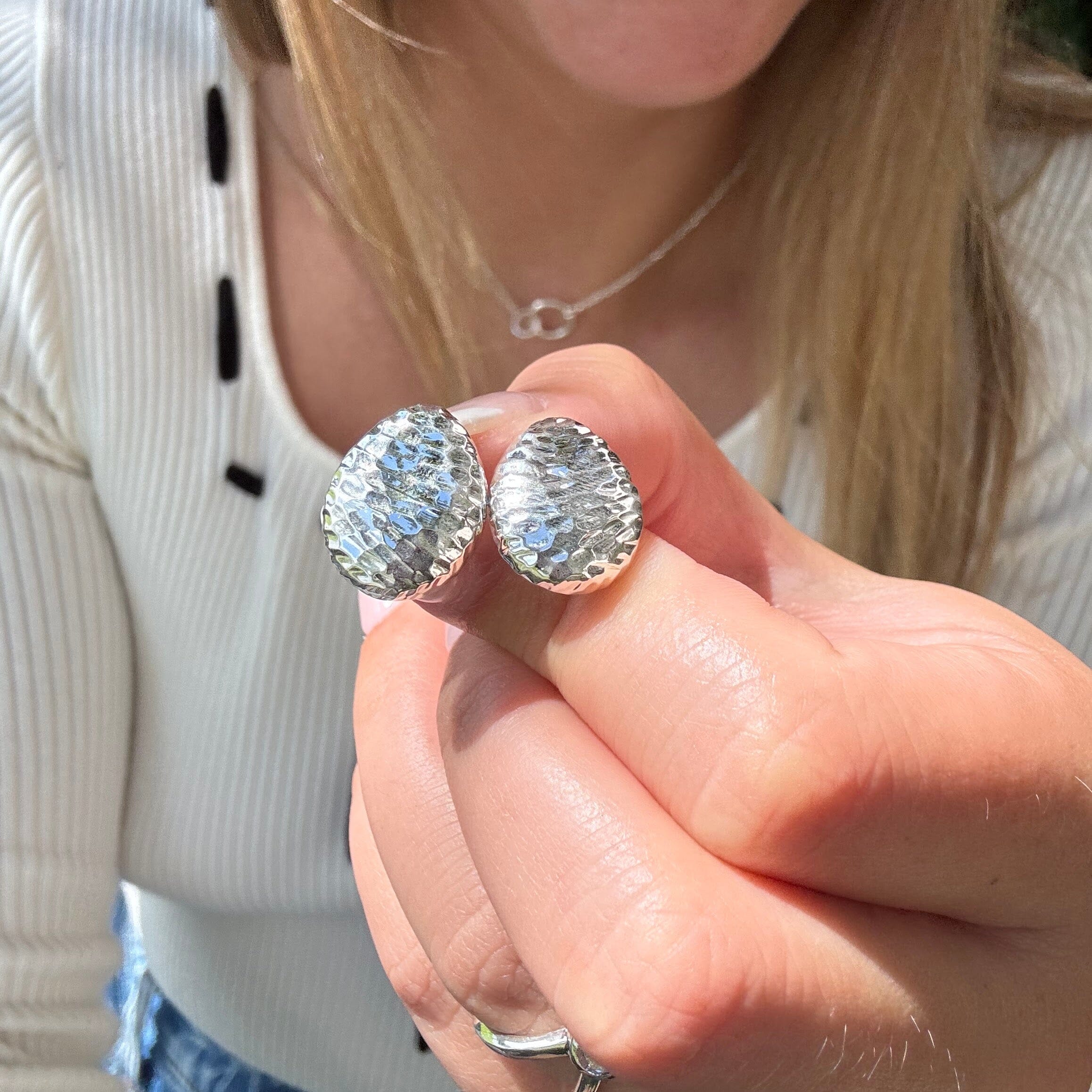 oval shaped hammered stud earrings in sterling silver