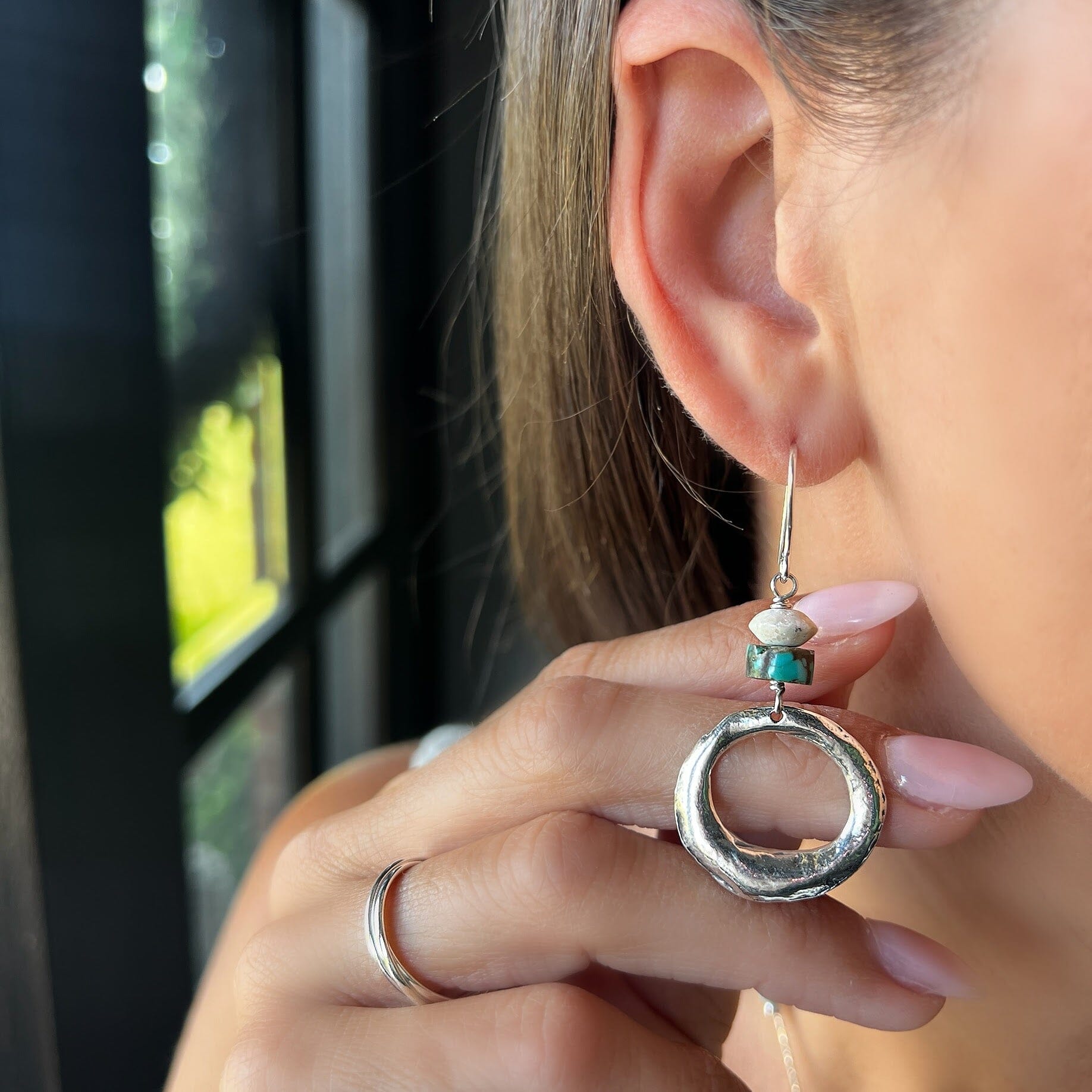 sterling silver dangle earrings paired with the trio ring