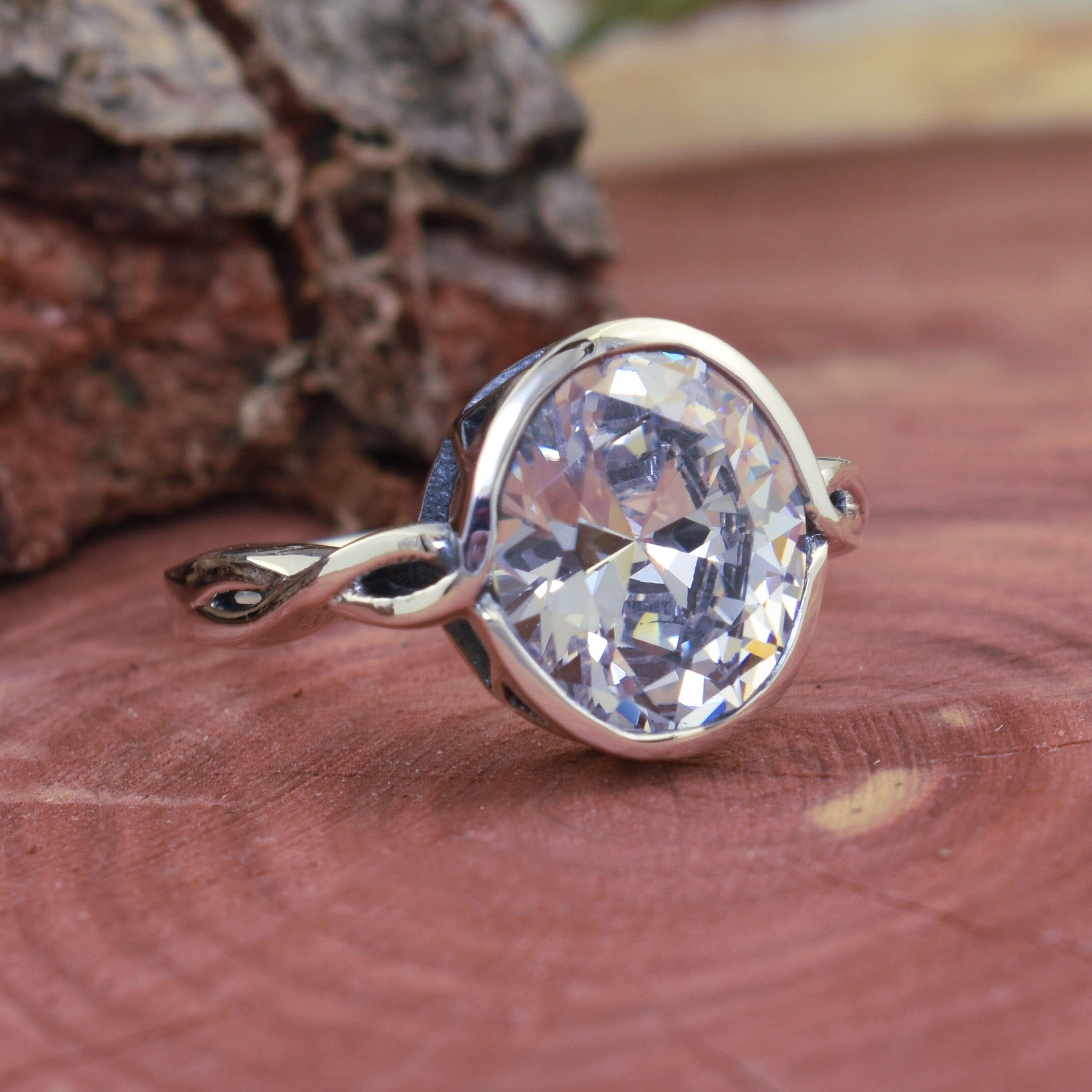 Ornate sterling silver ring with generous sized oval CZ