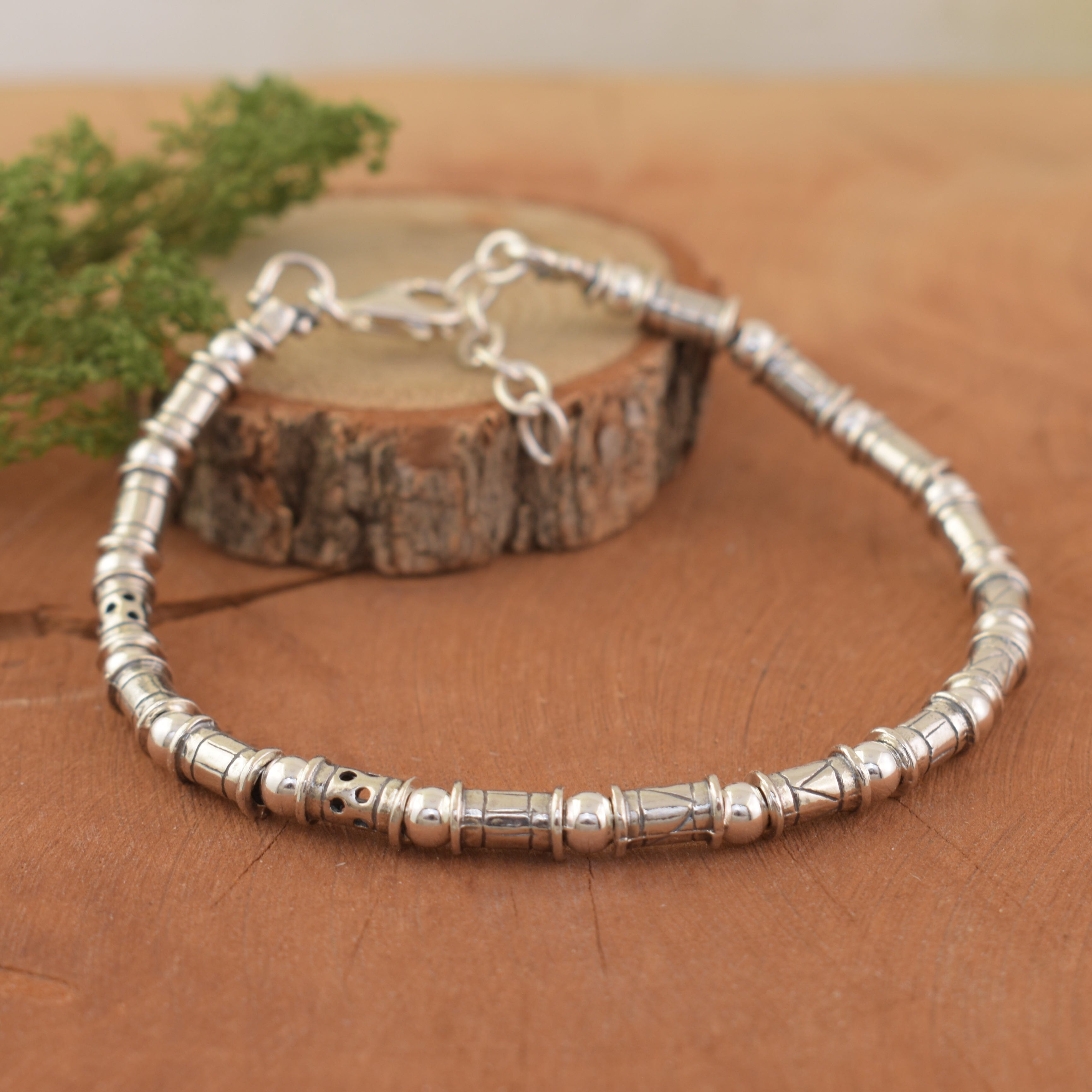 .925 designer sterling silver bracelet with round and tube style beads