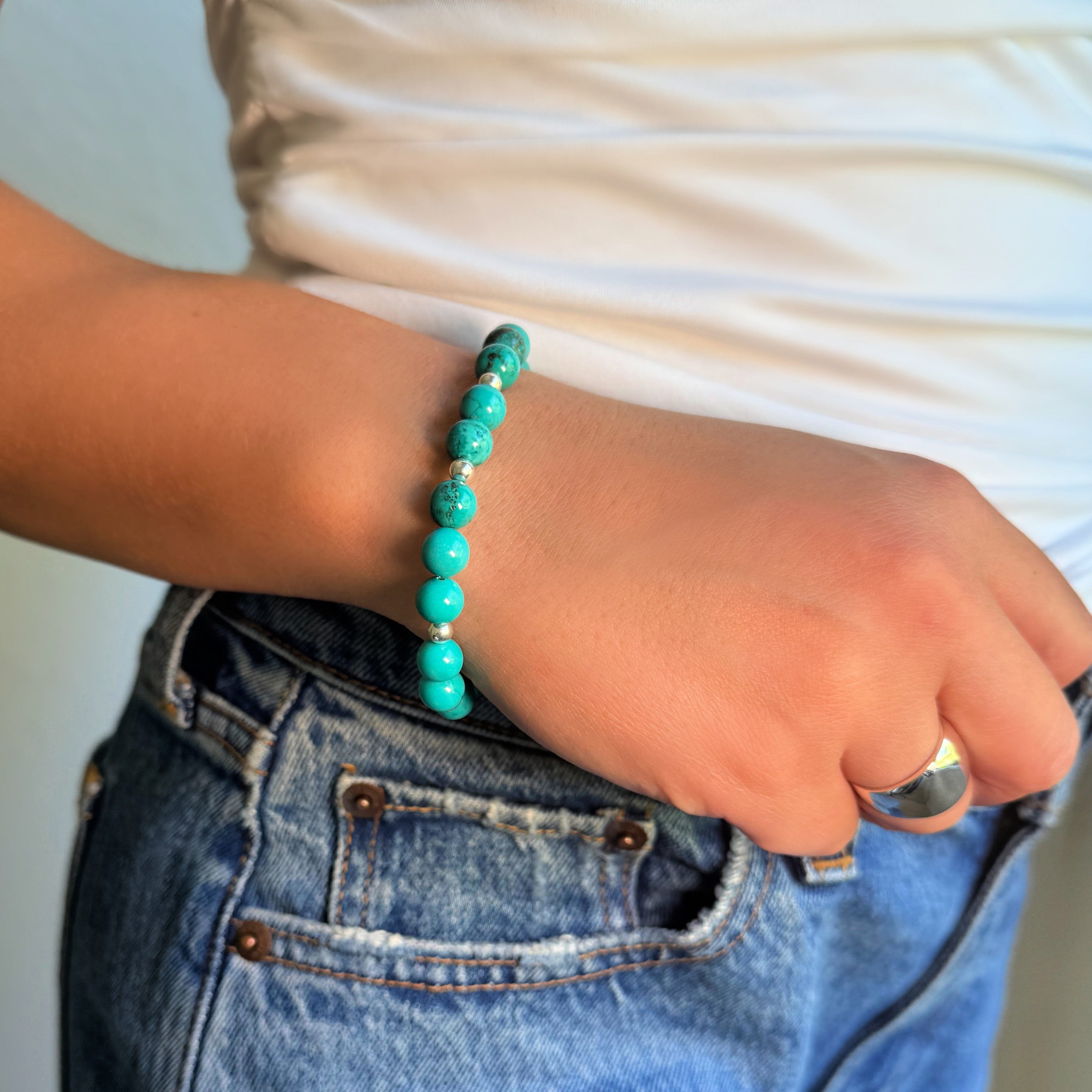 sterling silver barrel bead bracelet with turquoise stones paired with the classic dome ring