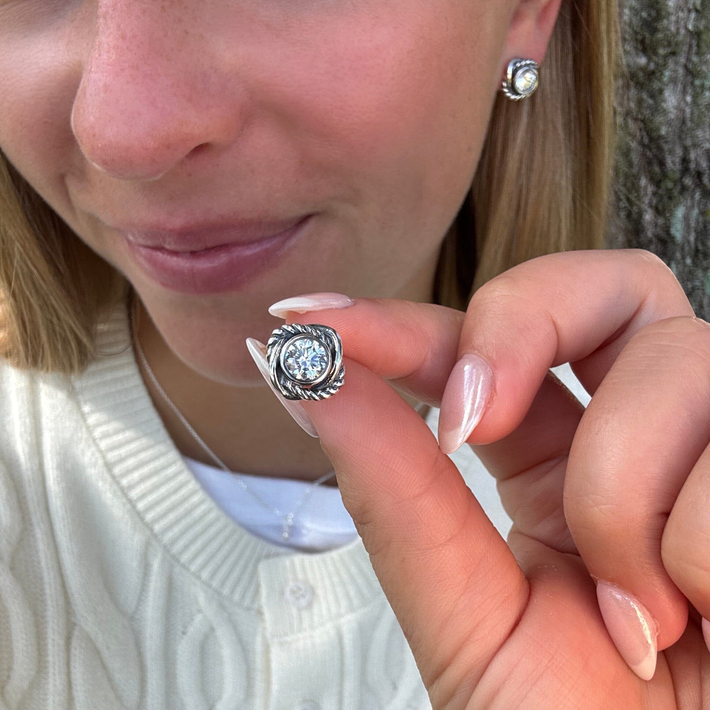 square push-back post earrings featuring a round center cz stone