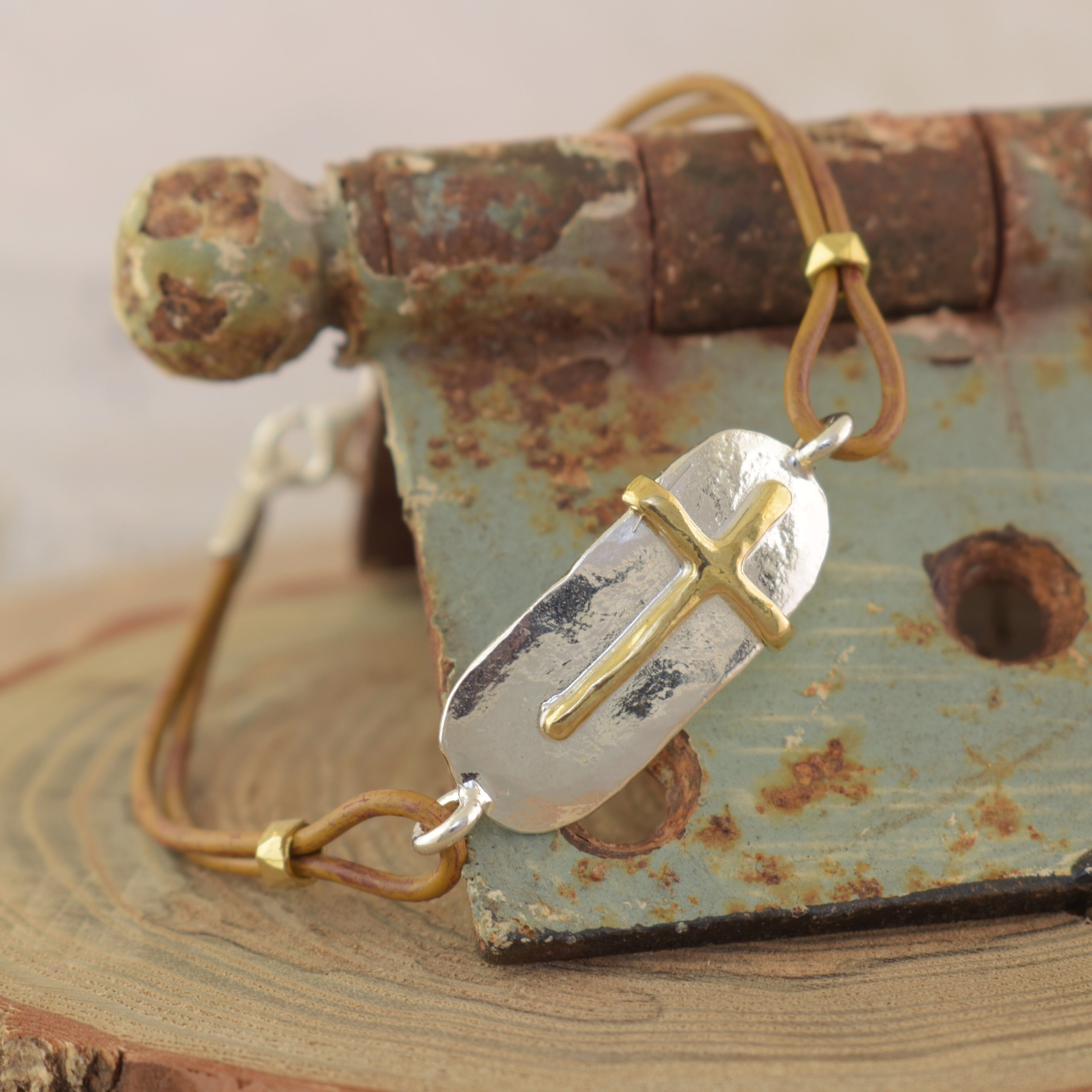 sterling silver featuring a gold plated cross