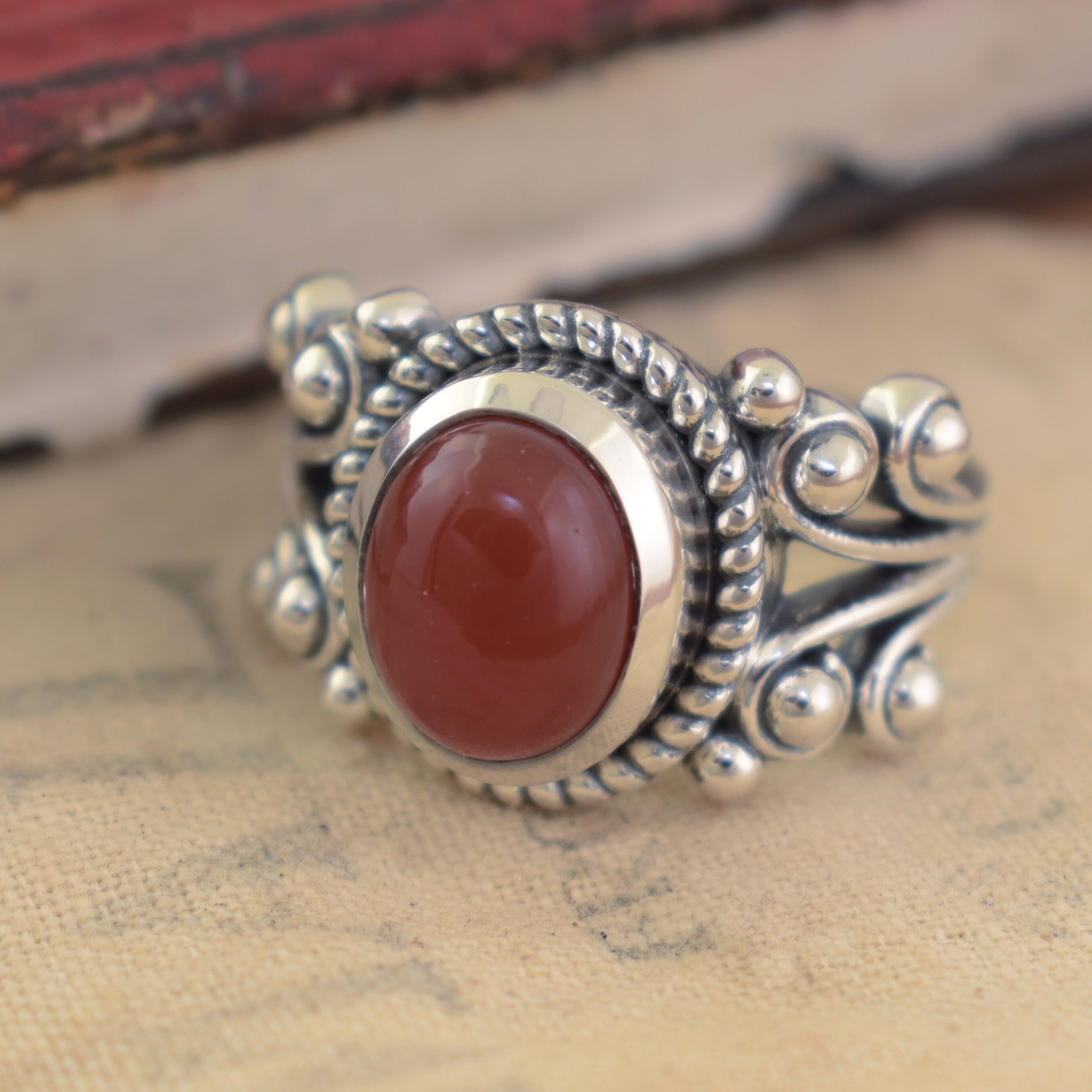 Cinnamon Onyx oval stone bezel set