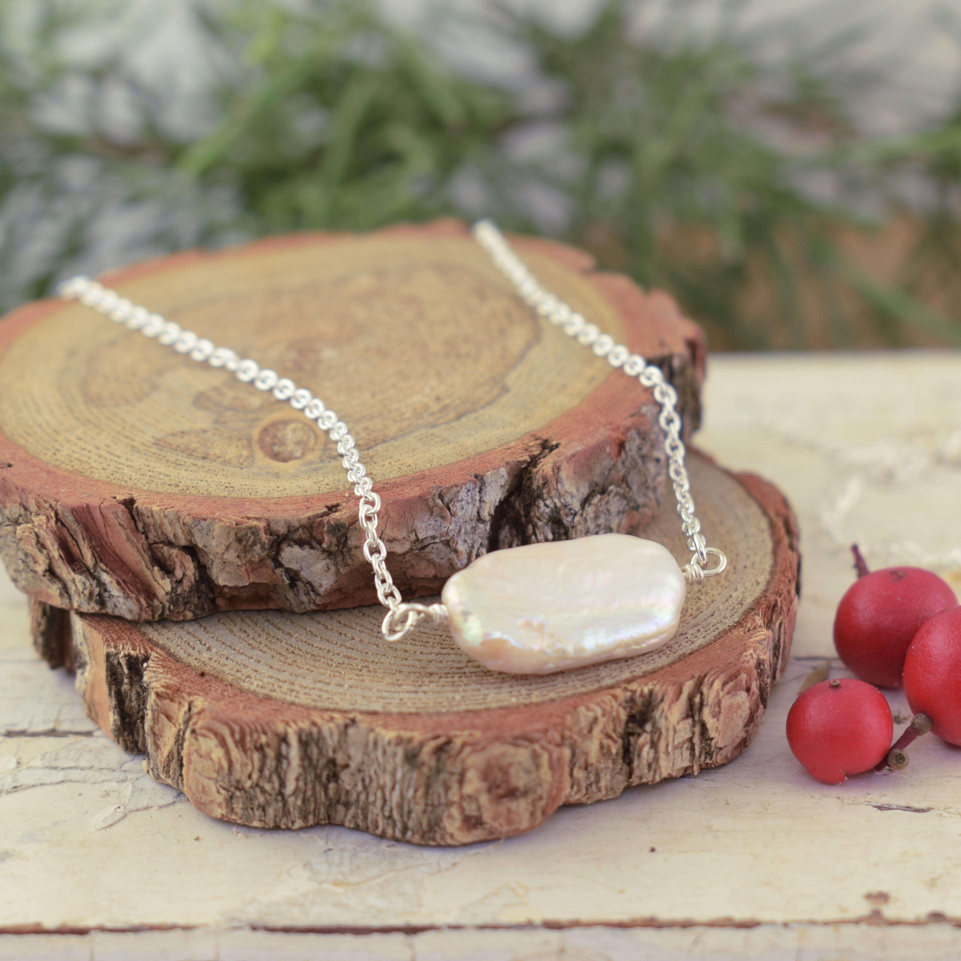 Freshwater Pearl strung on a sterling silver chain