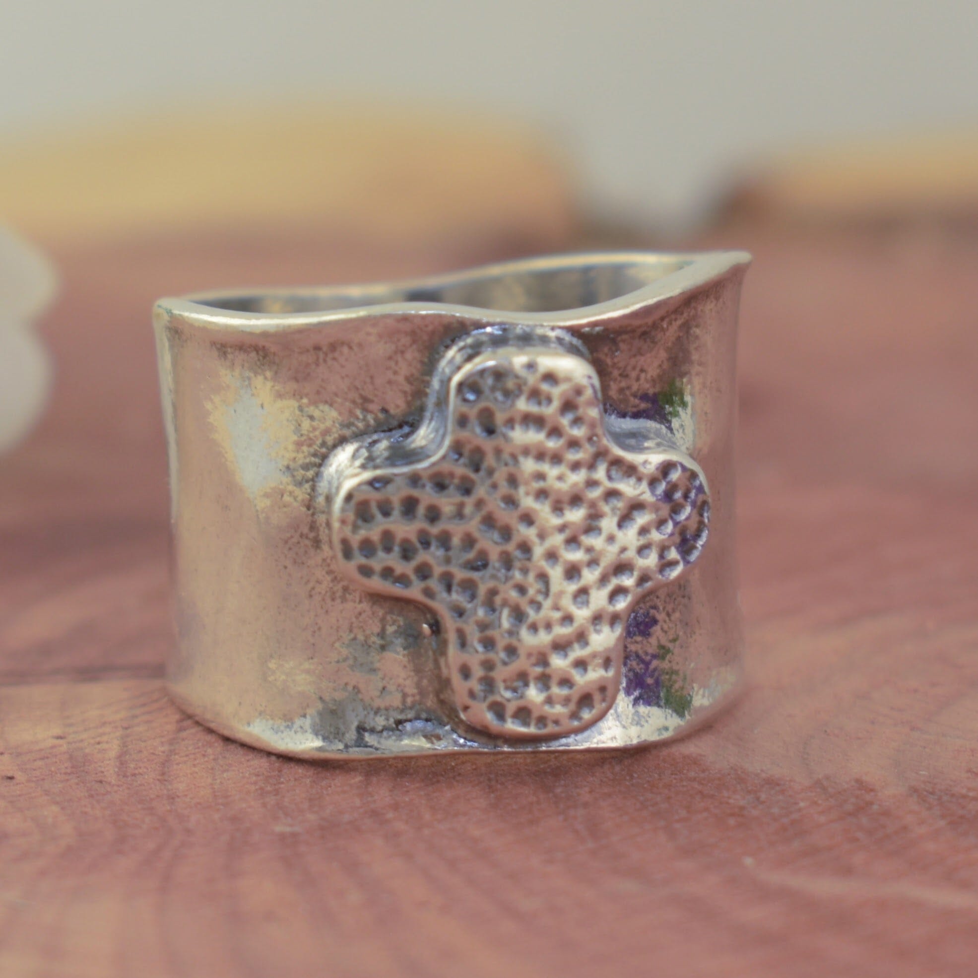 sterling silver wide band ring with an oxidized finish