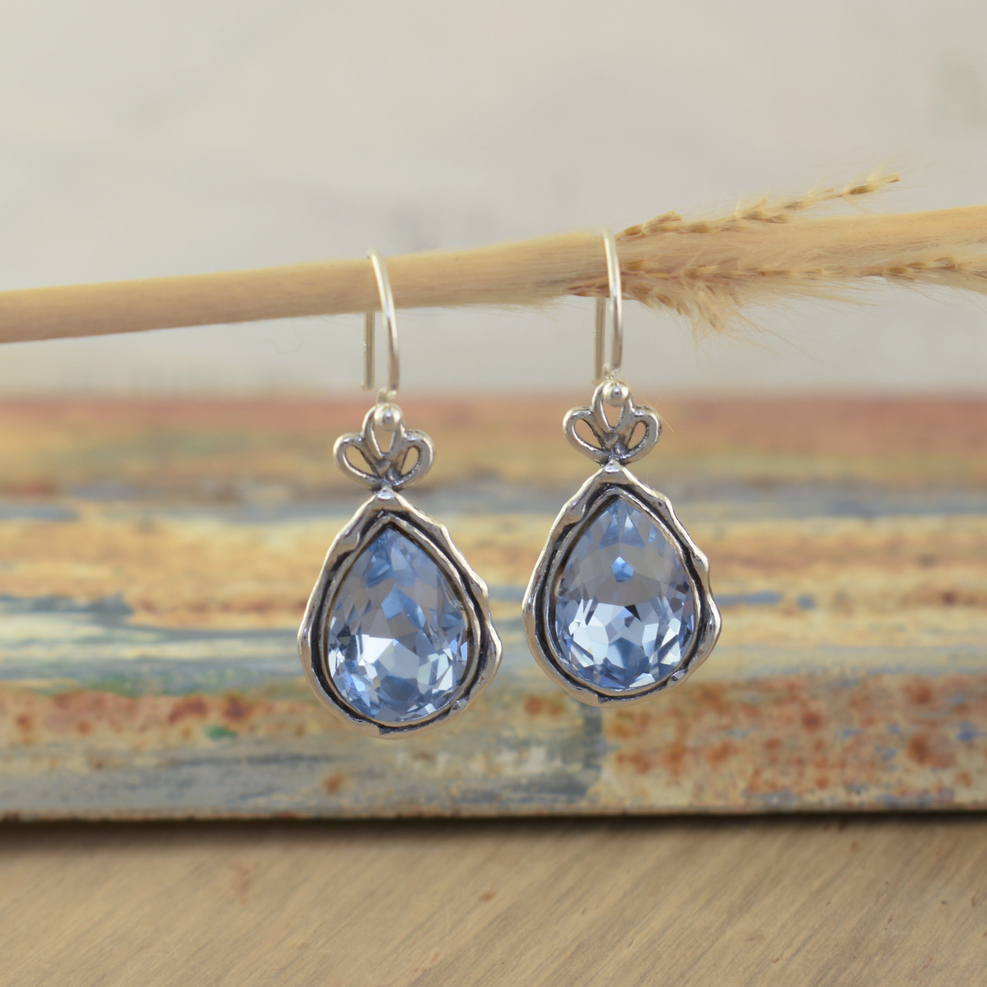 Sassy splashy earrings with blue stone