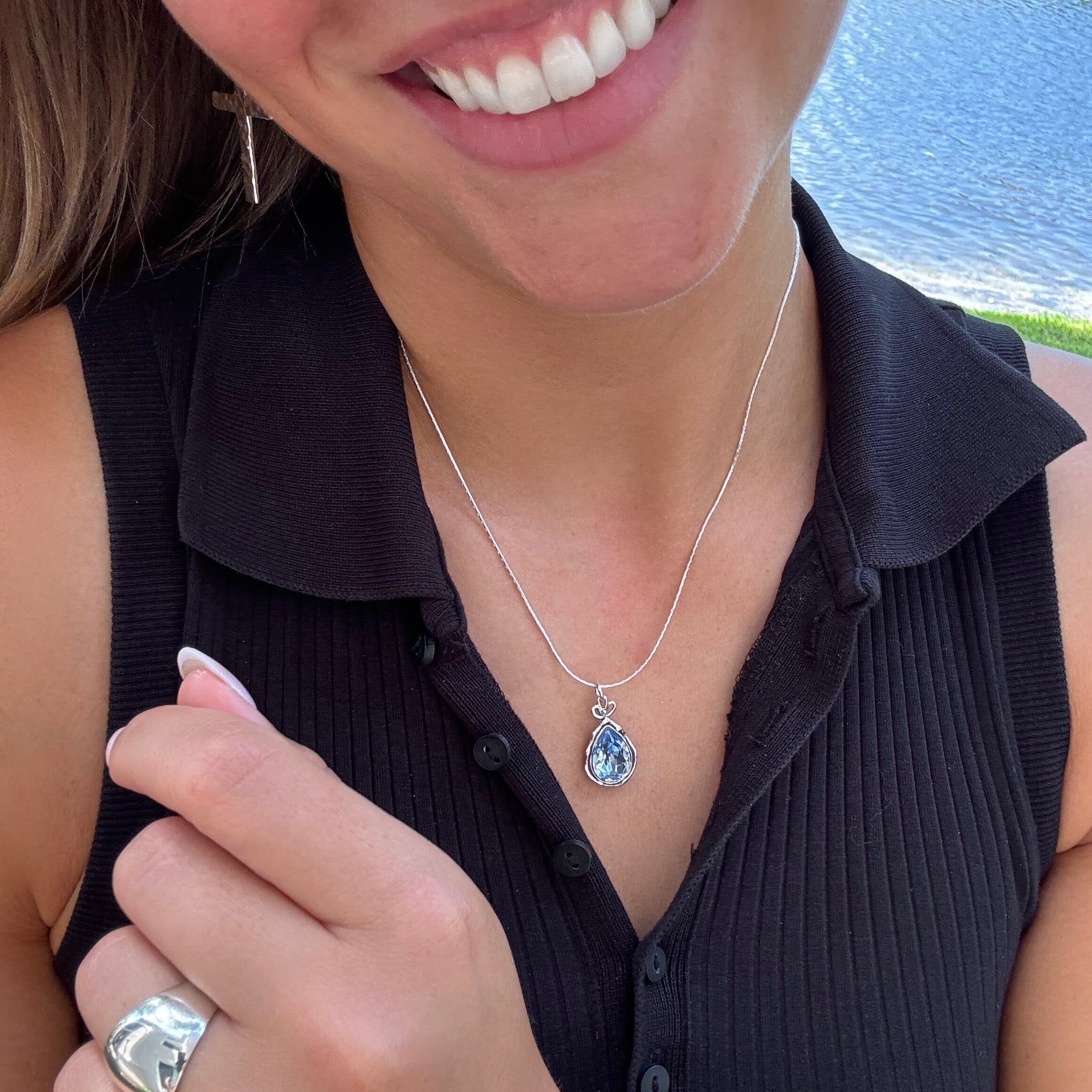 teardrop shaped sky blue pendant on a sterling silver chain