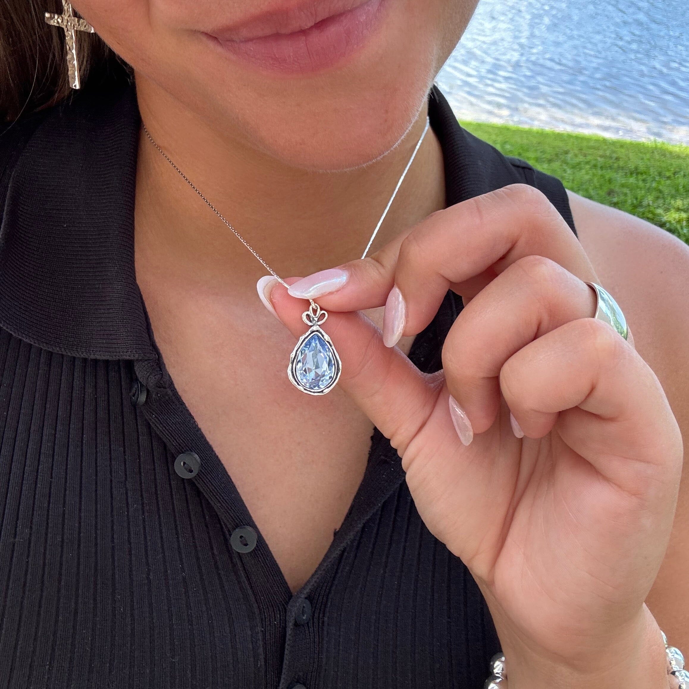 sky blue rhinestone bezel set in sterling silver pendant