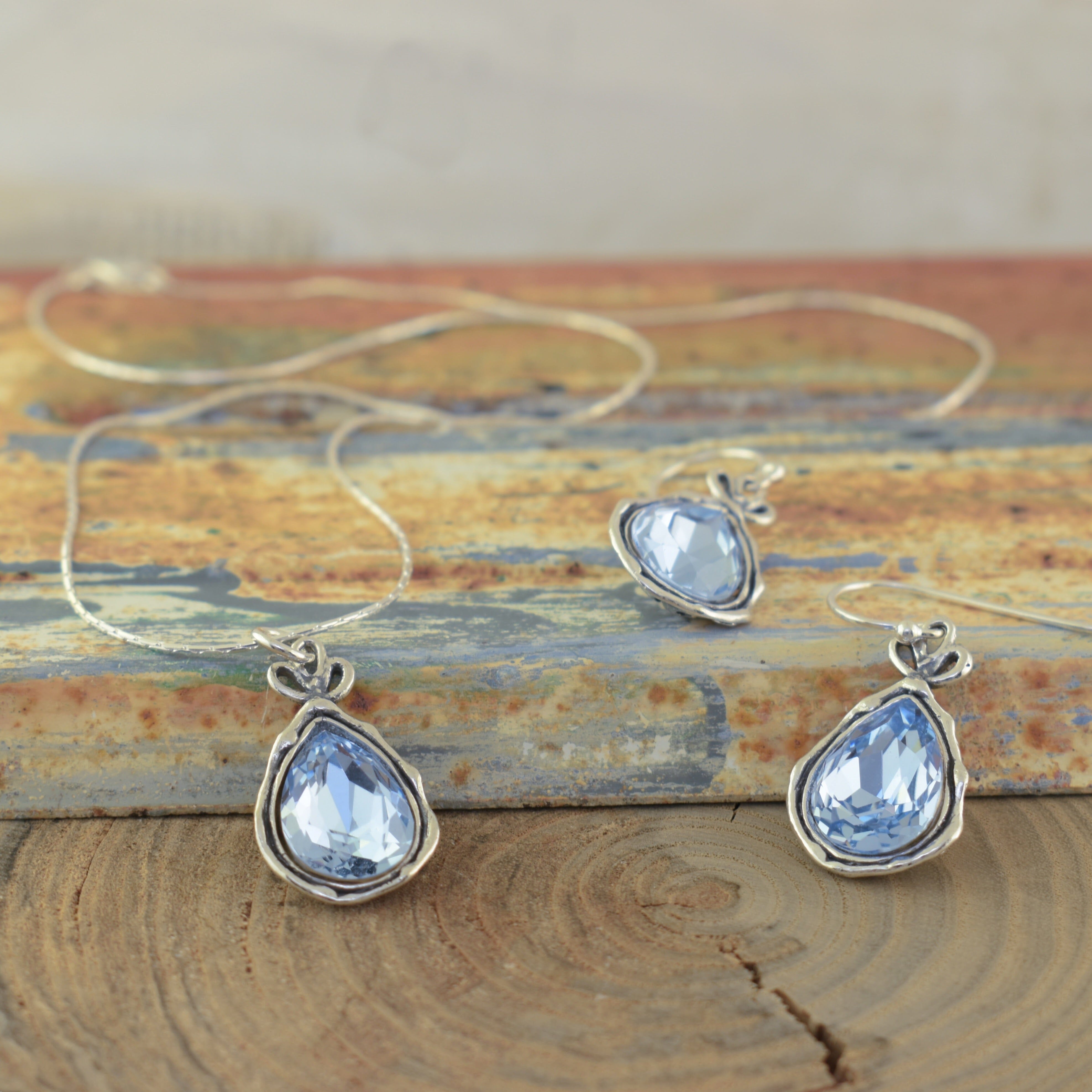 Handcrafted sterling silver earrings and necklace