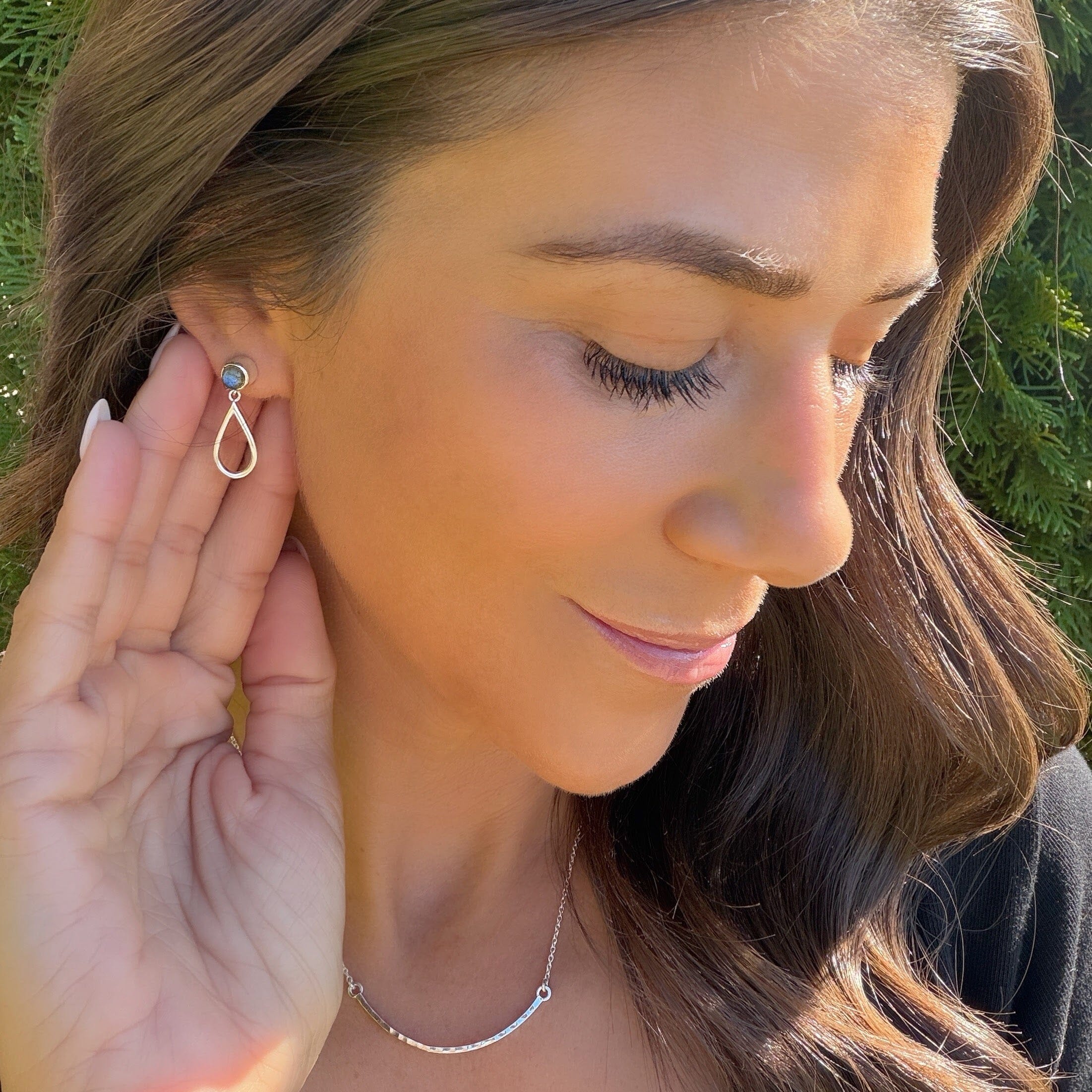 silver hammered earrings with a labradorite stone