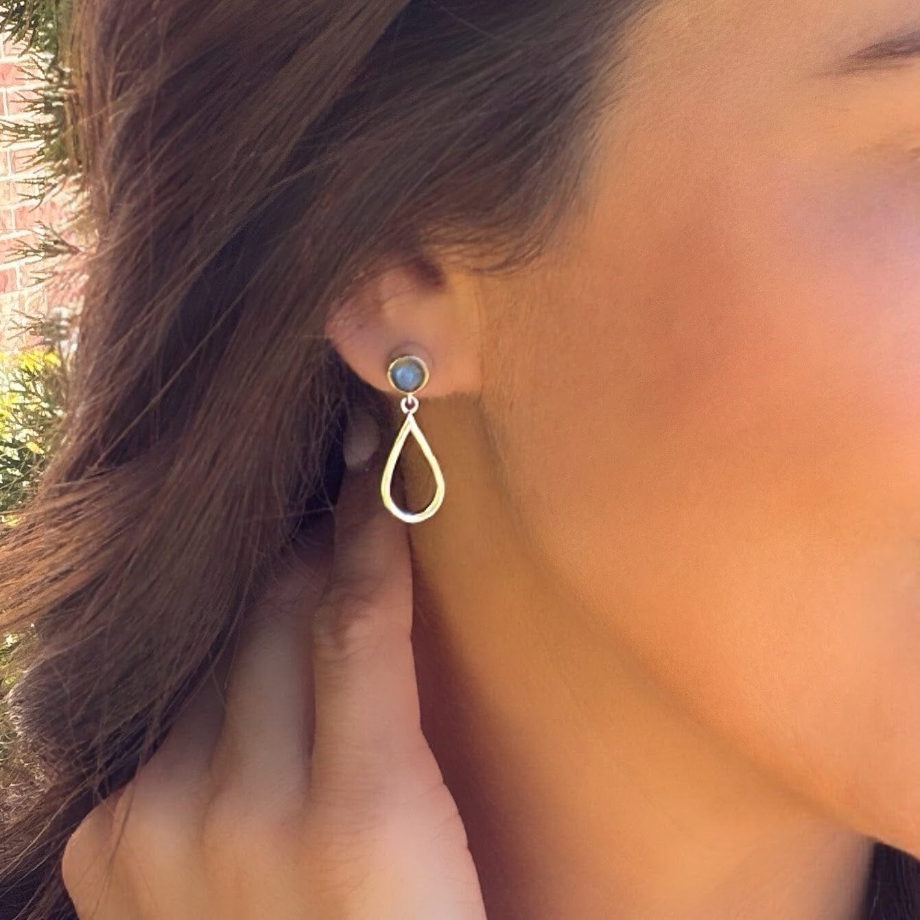 labradorite push-back post earring with a teardrop shaped silver dangle