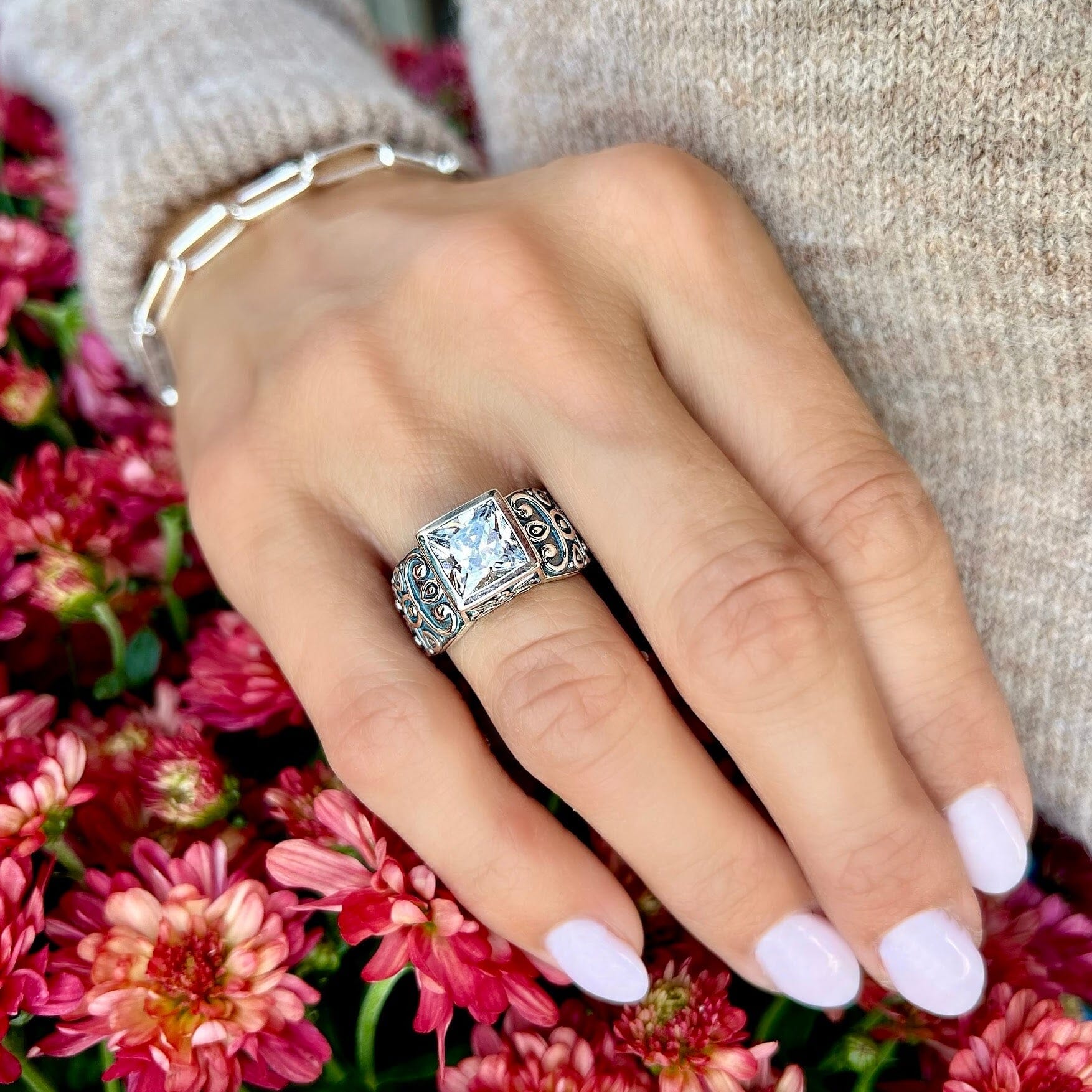 square-cut cubic zirconia bezel set in designer silver ring