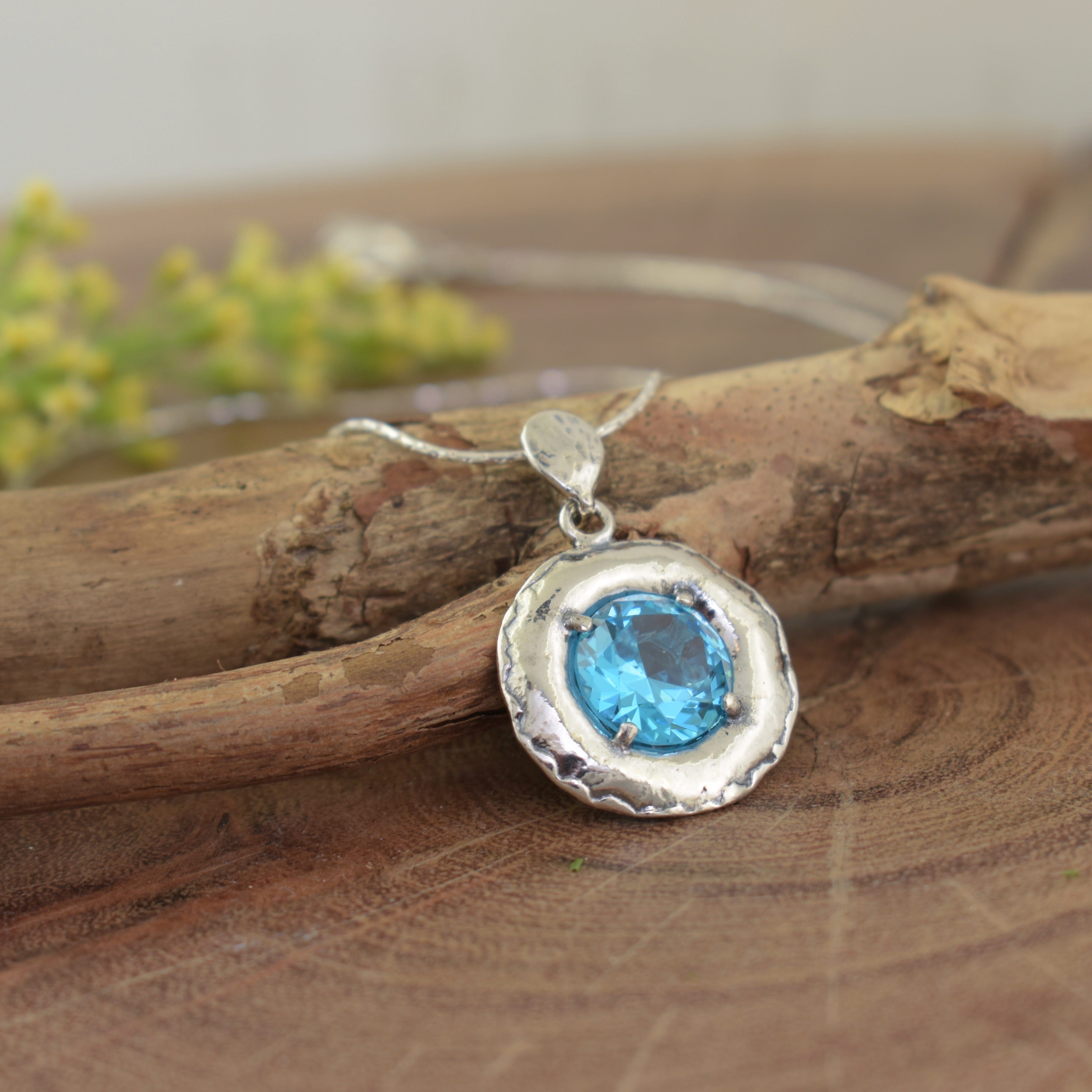 Sterling silver prong set blue cz stone