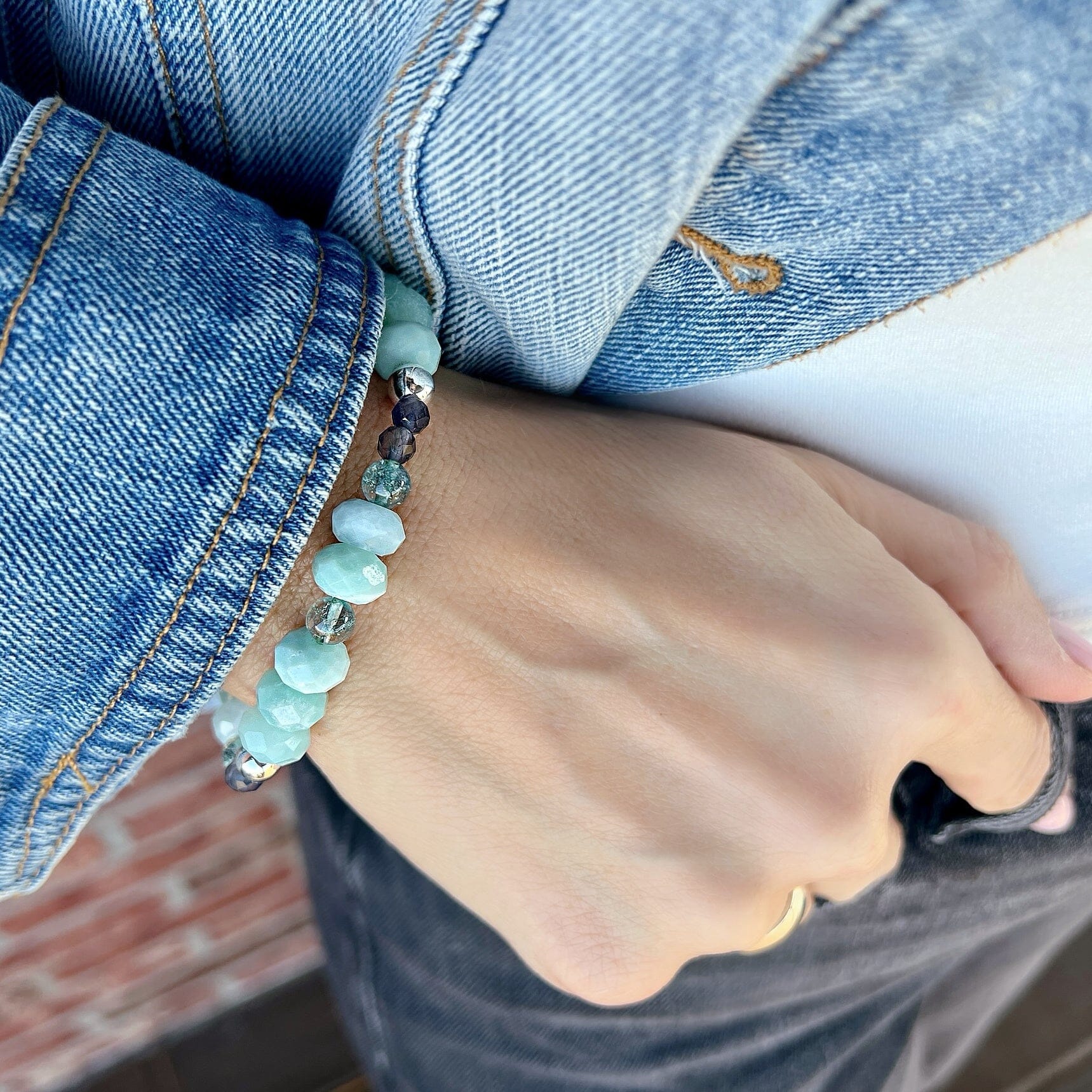 stretchy beaded bracelet featuring different shades of blue and green