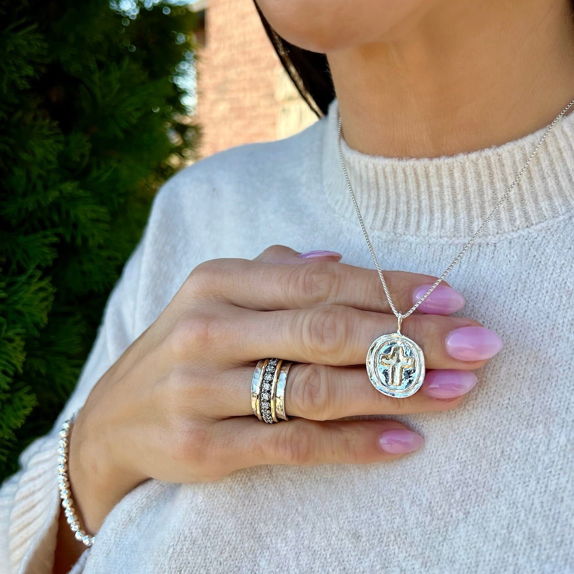 Sterling silver necklace with a gold plated cross