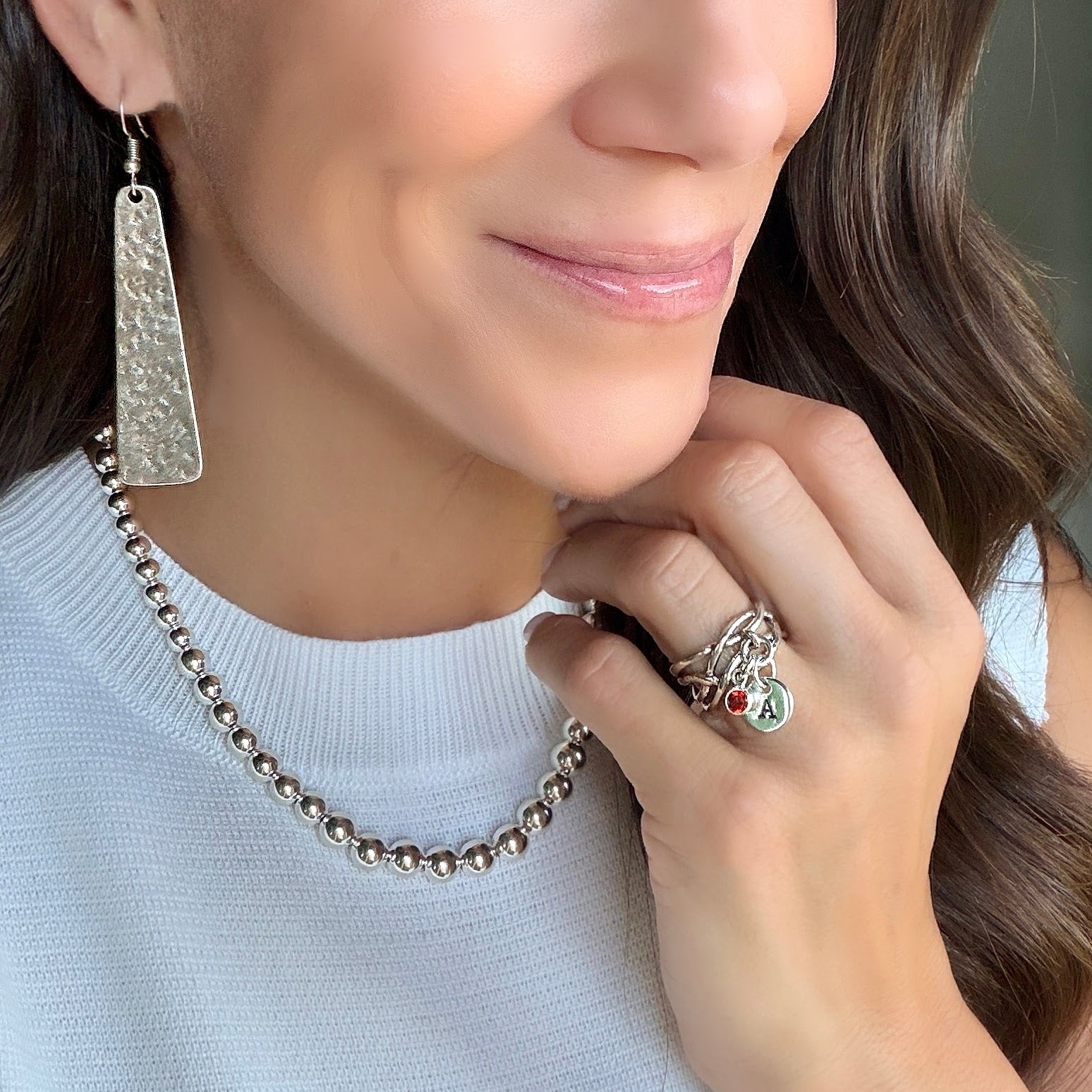 Sterling silver ring with classic bead necklace and canyon drift bangle and simply extra earrings