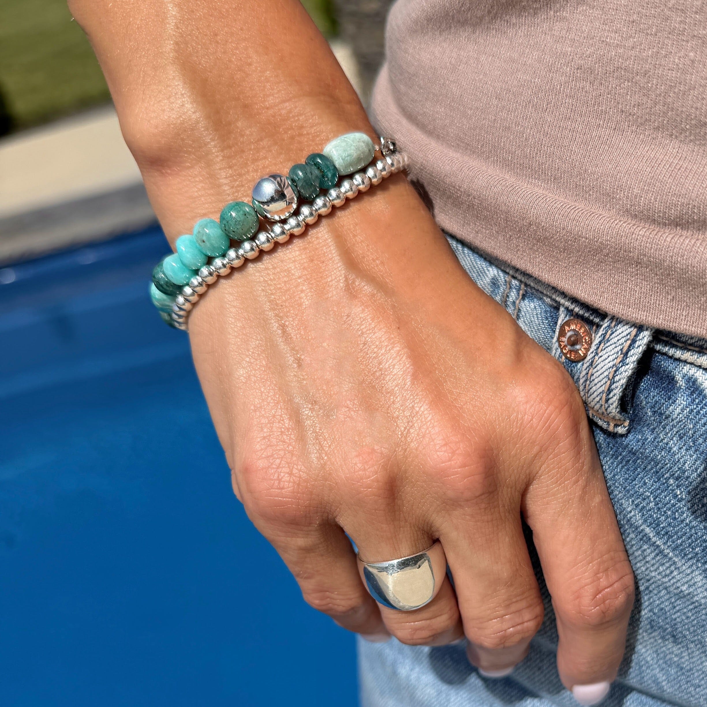 sterling silver and various turquoise colored stones