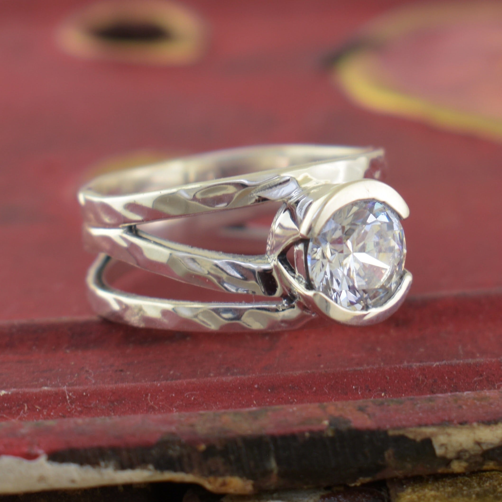 high polished sterling silver ring with a round clear CZ stone 