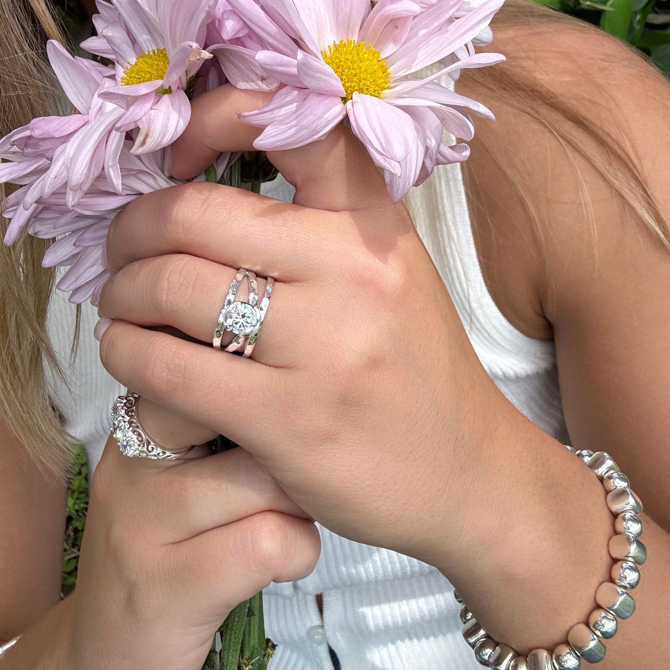 brilliant clear cubic zirconia stone bezel set in unique sterling silver ring