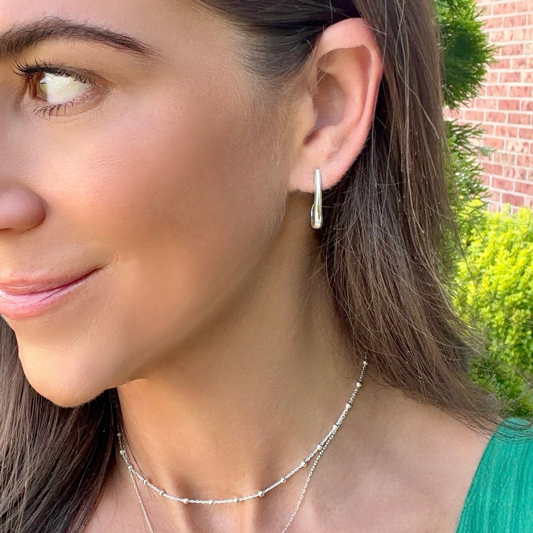 curved push-back post earrings that dangle
