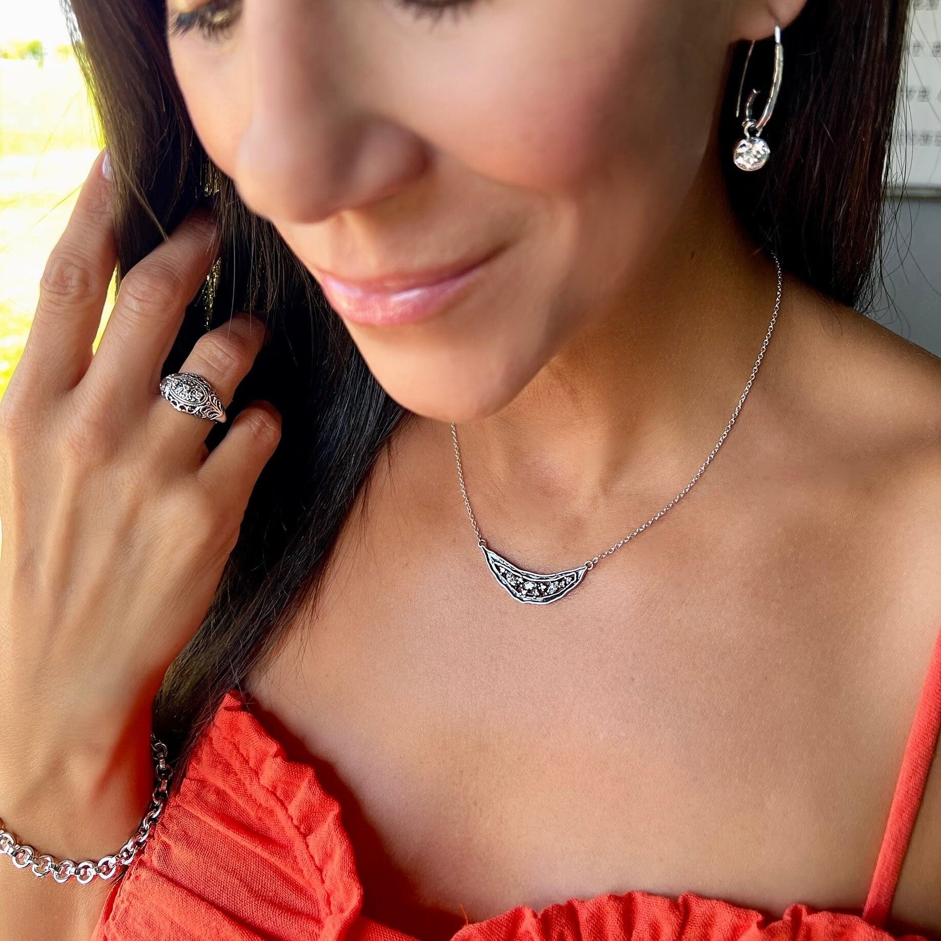 Silver Curve necklace sterling .952 Silver Drift necklace paired with In a Whirl earrings and Vintage Splendor ring