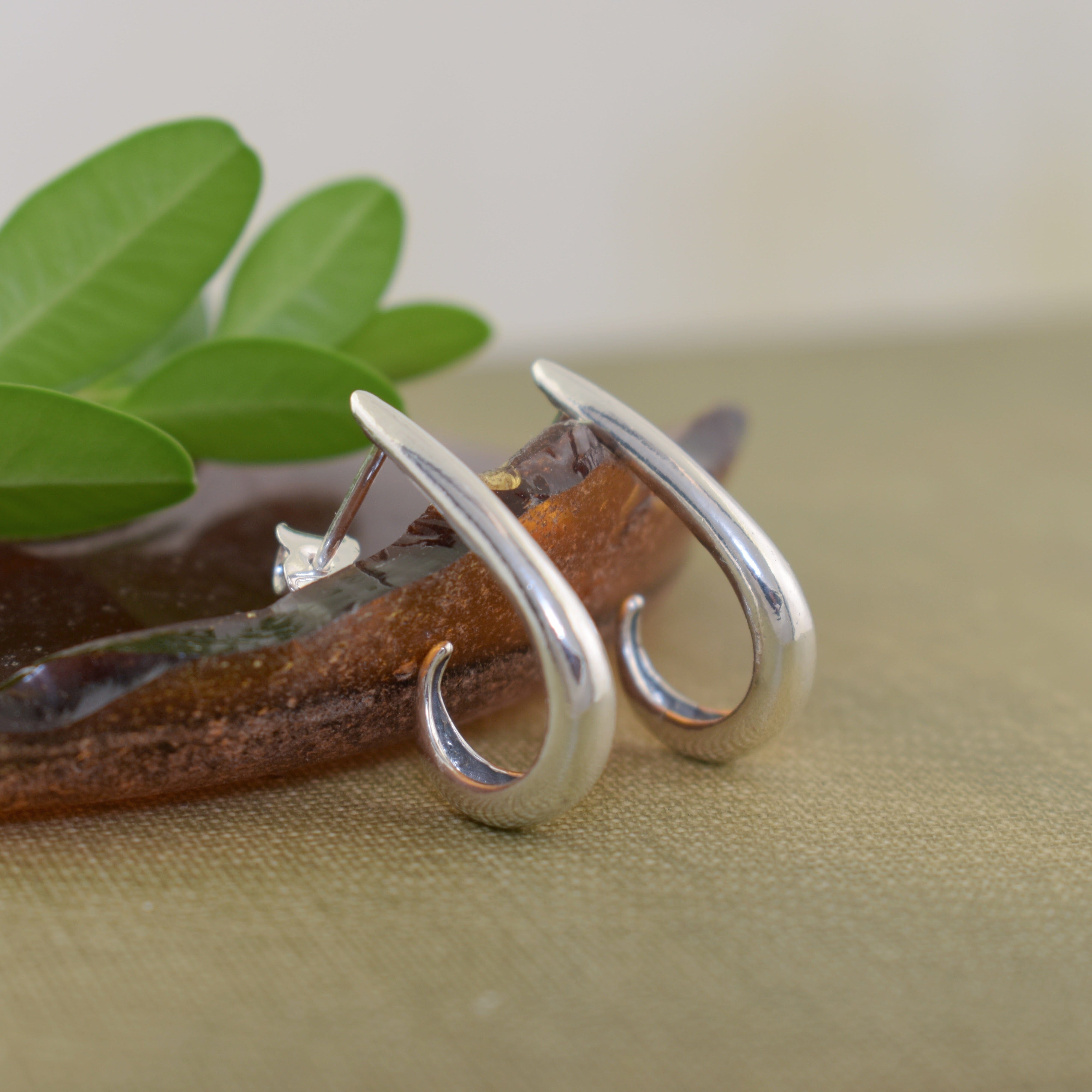Sterling silver swoop designed earrings
