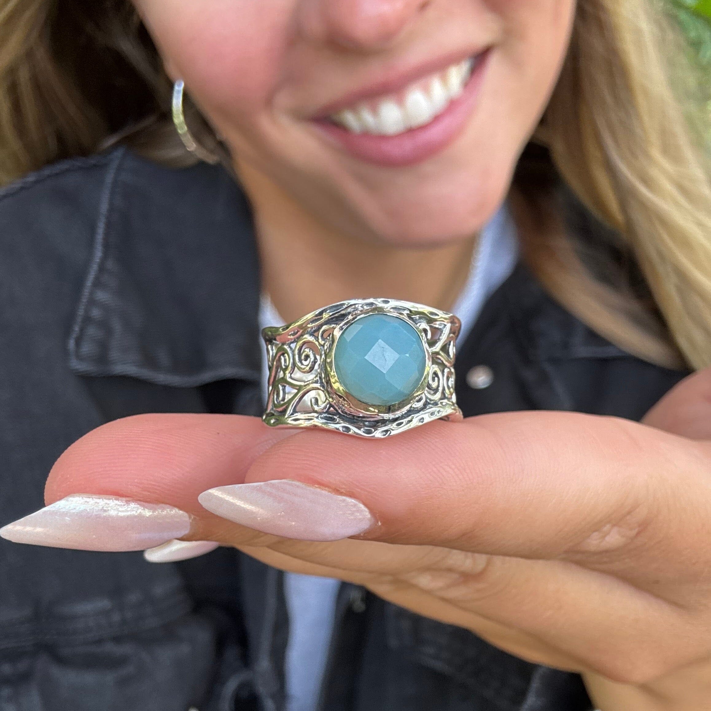 handcrafted sterling silver ring featuring a bezel set stone