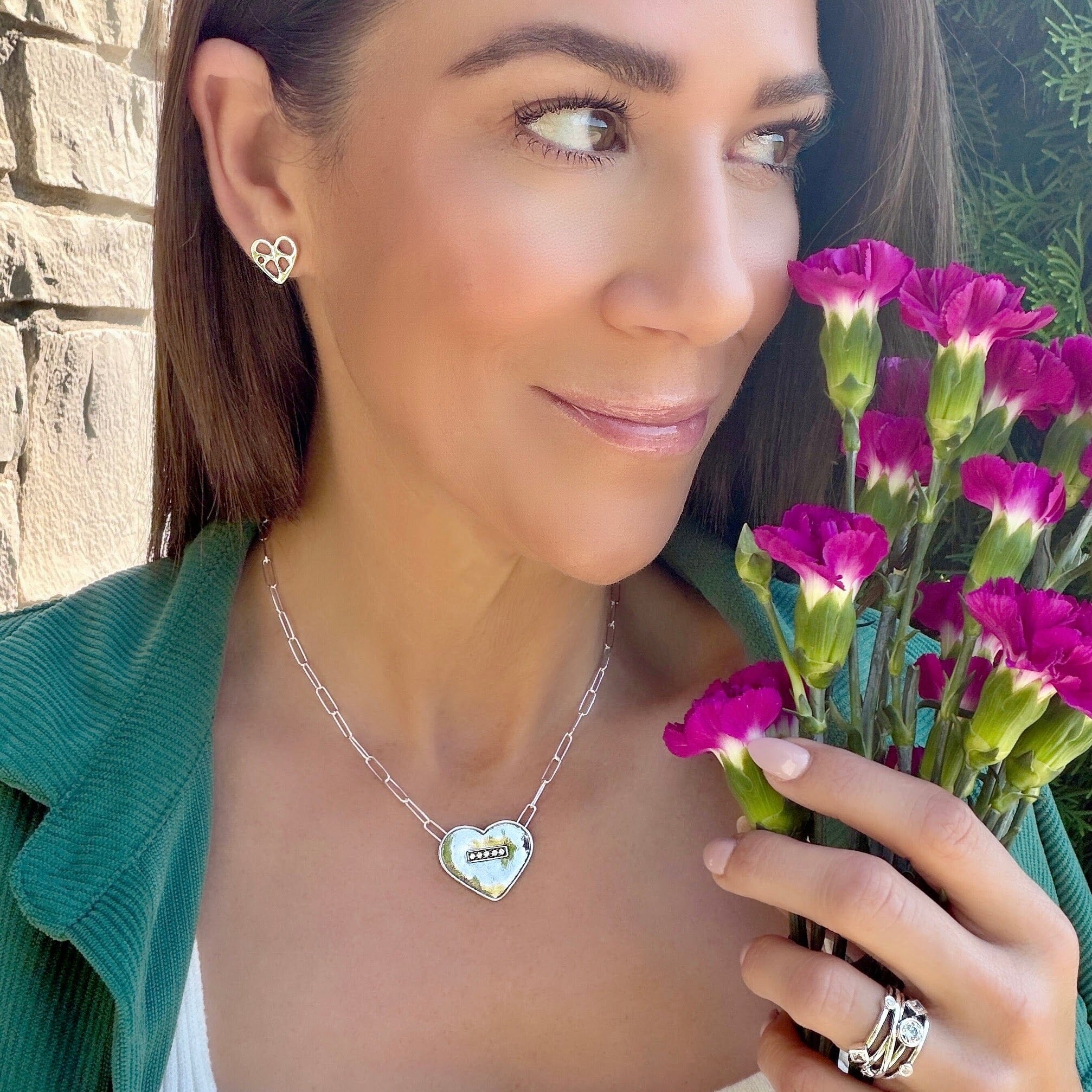cut-out heart earrings in silver