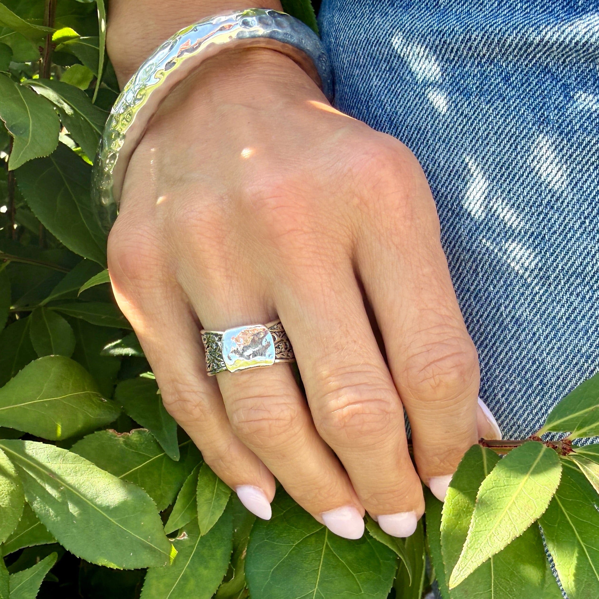 sterling silver ring with filigree and hammered designs