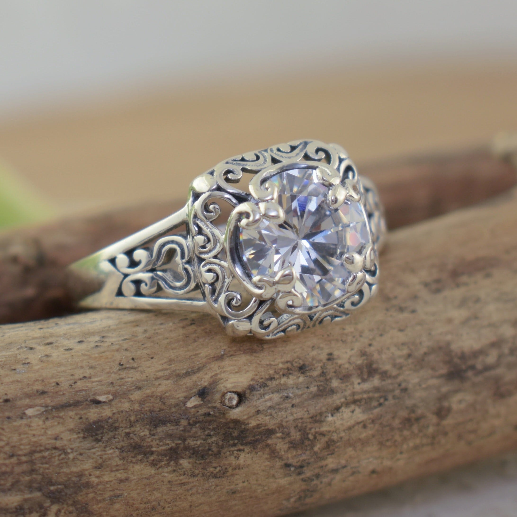 Vintage-inspired sterling silver ring with round CZ stone