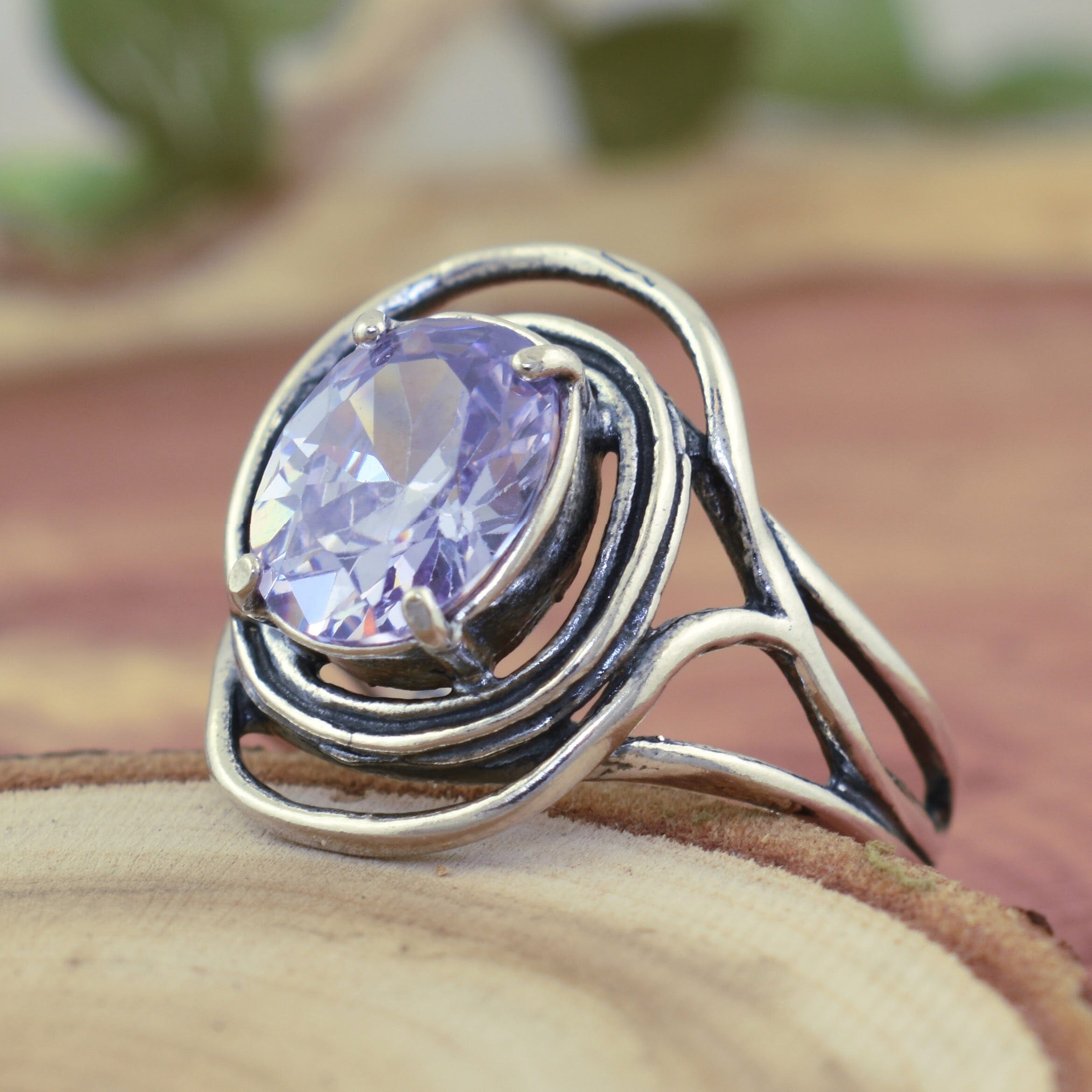 .925 sterling silver designer ring with oval purple lavender