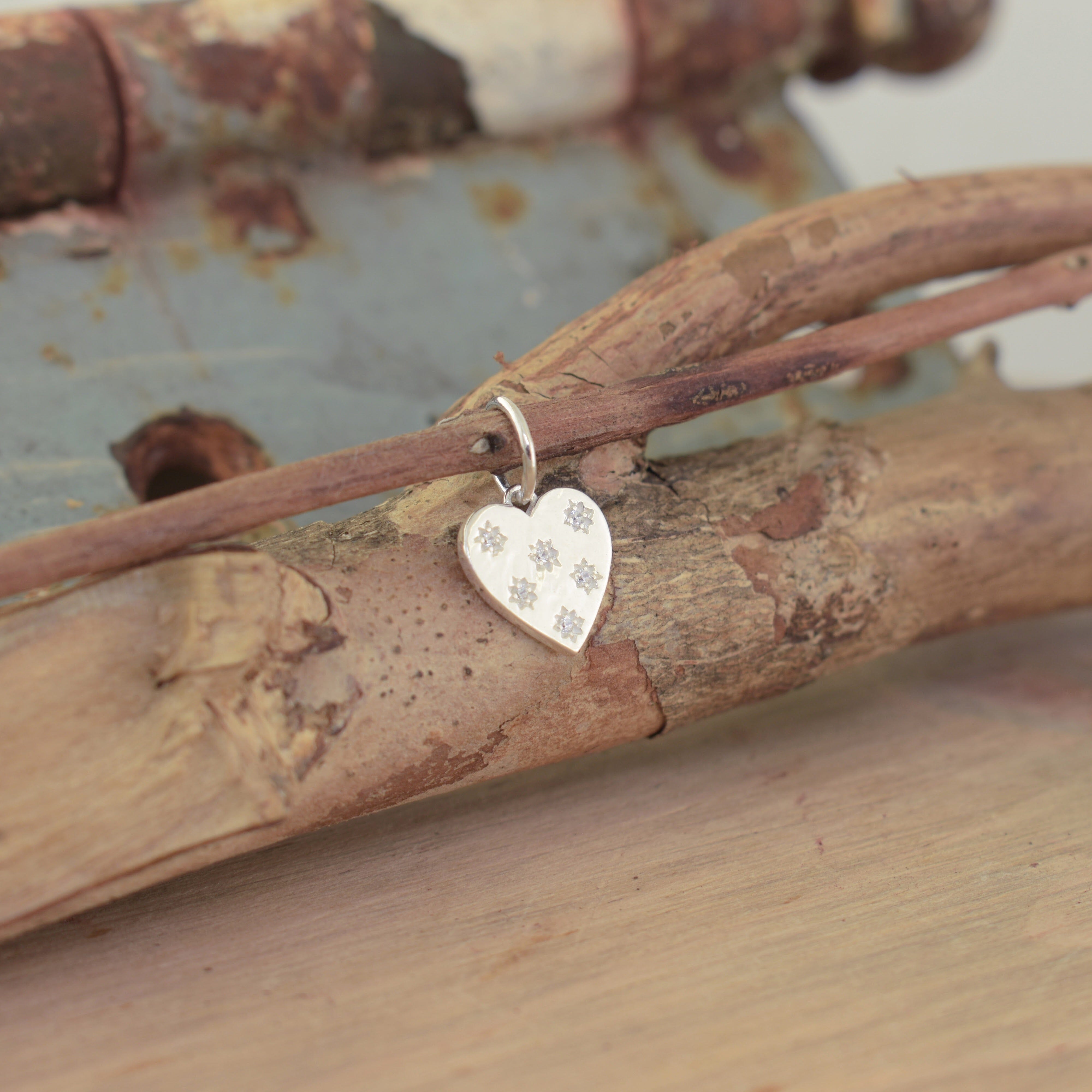 Sterling silver high polsihed heart pendant with Cz stones