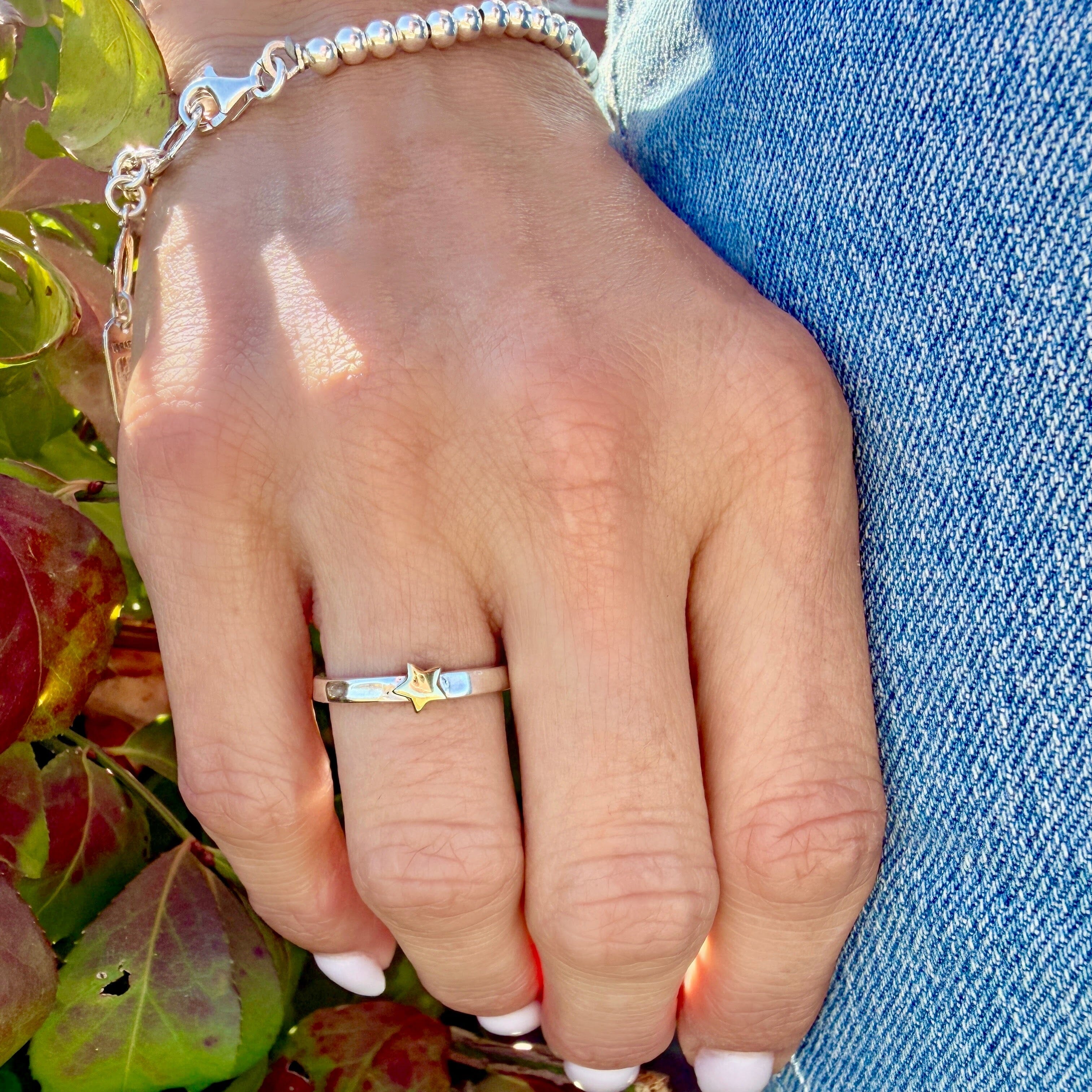 sterling silver band with a brass star